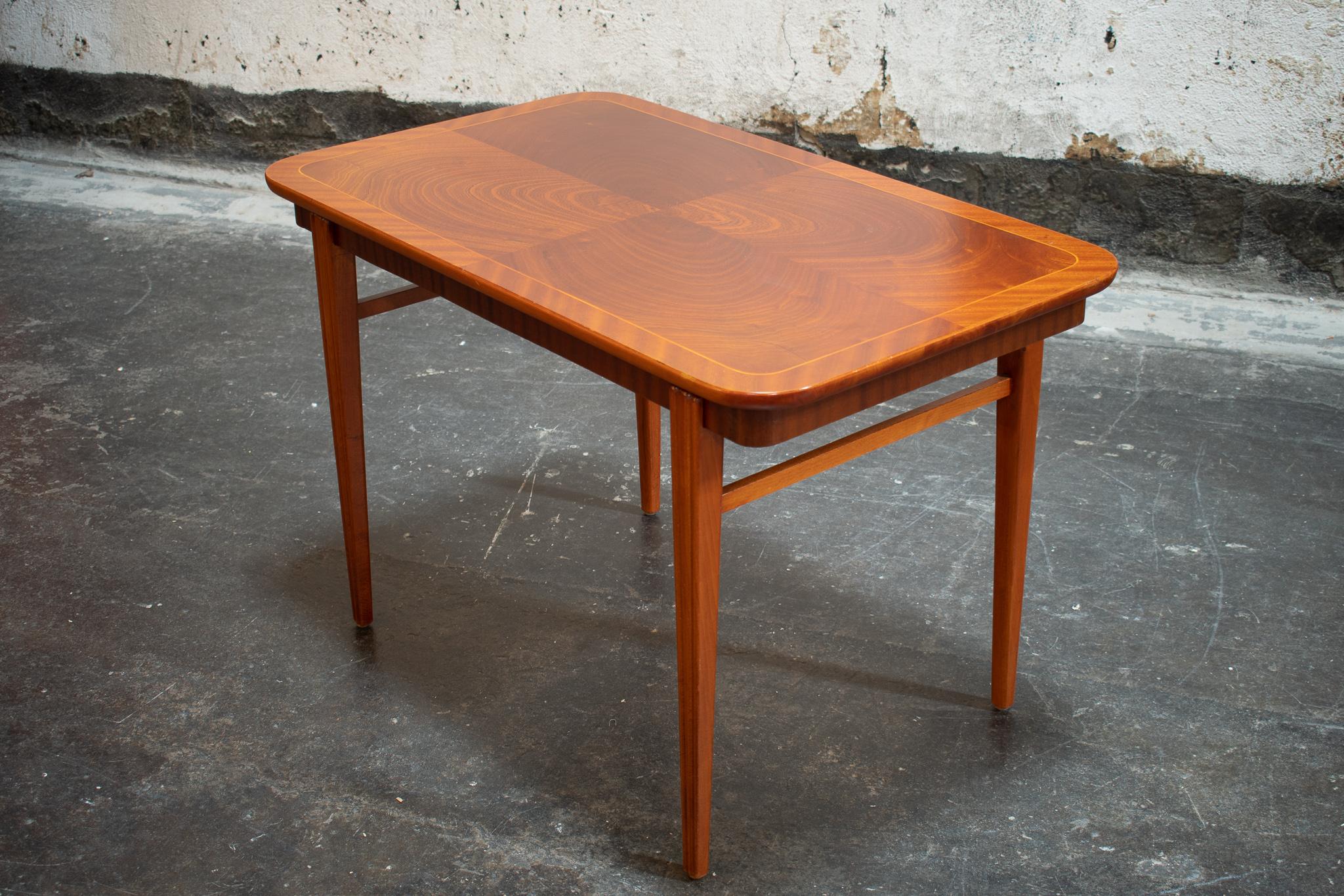 Large Mid-Century Modern end or side table made of beautiful crotch mahogany. Known in Sweden as 