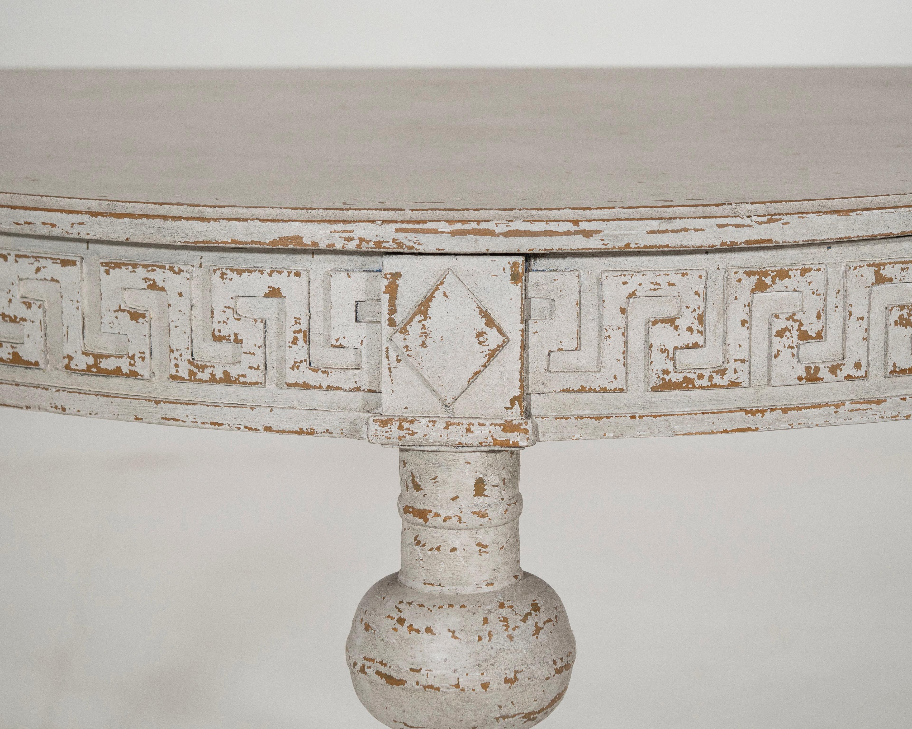 Fine pair of Swedish demi-lune consoles tables, richly carved, 19th C.