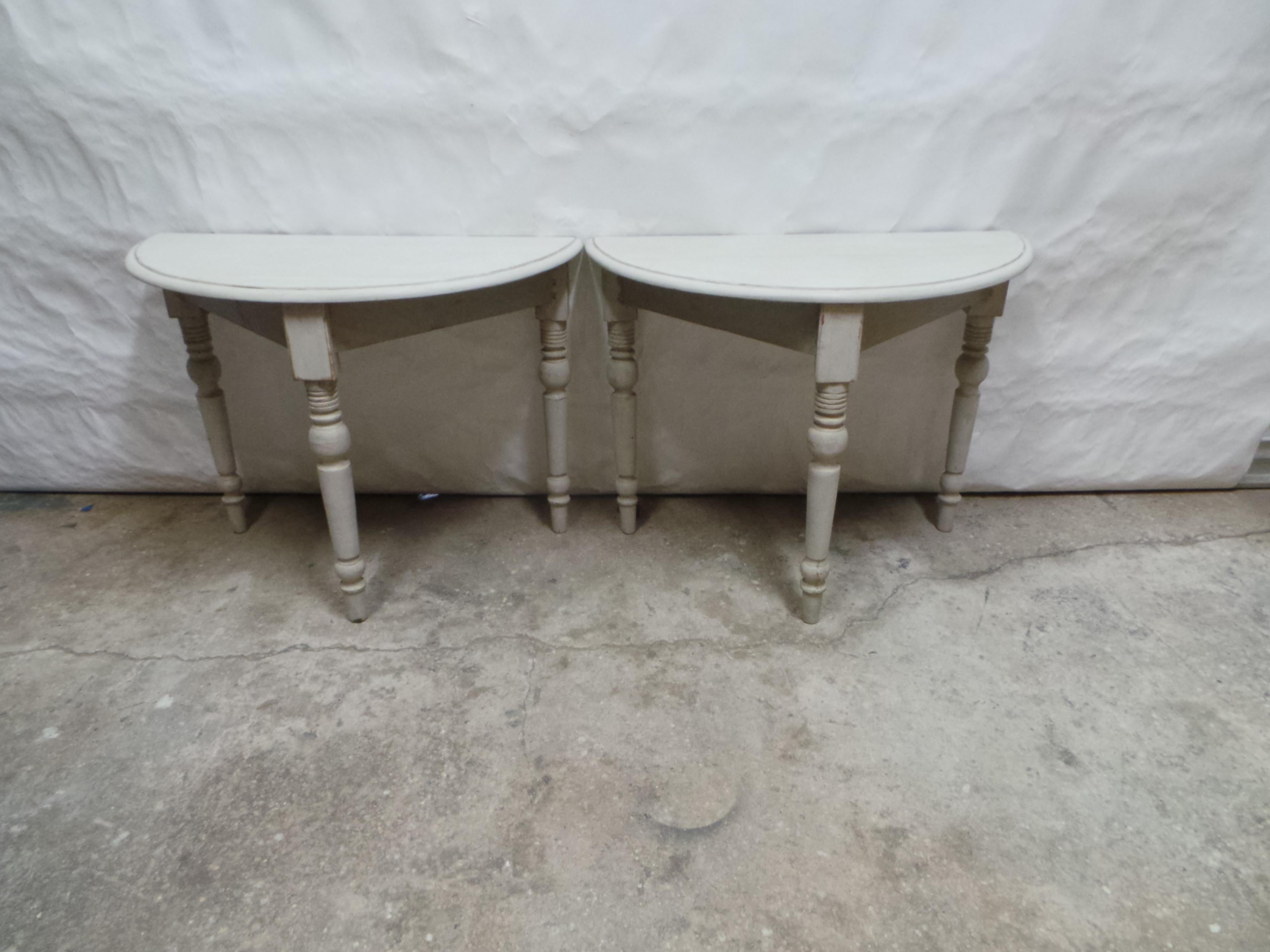 This is a set of 2 Swedish Demi Lune Tables 19th Century. they have been restored and repainted with Milk Paints 