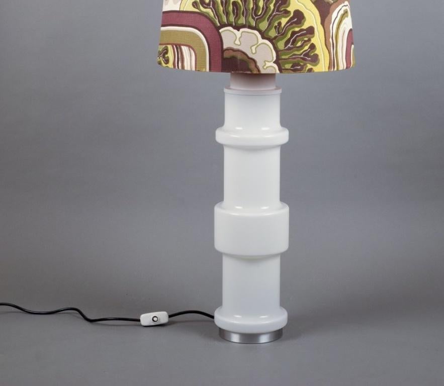 Scandinavian Modern Swedish design. Colossal floor lamp in glass with a textile shade. For Sale