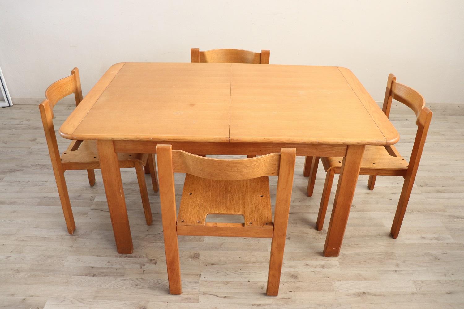 Swedish design solid oak wood dining room set, 1970s. This set includes:
1 extendable dining room table, dimensions extended table cm 185 / inch 72,83
4 chairs
Good vintage conditions.