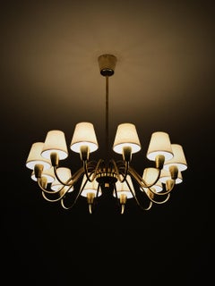 Swedish designer 12 arm brass and fabric chandelier, 1960s