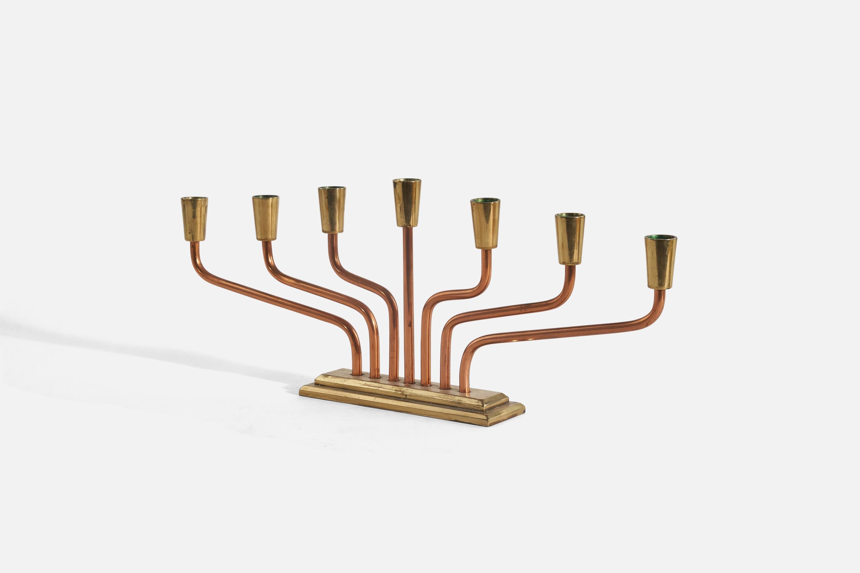 A copper and brass, adjustable 7-candle candelabra designed and produced in Sweden, c. 1975.