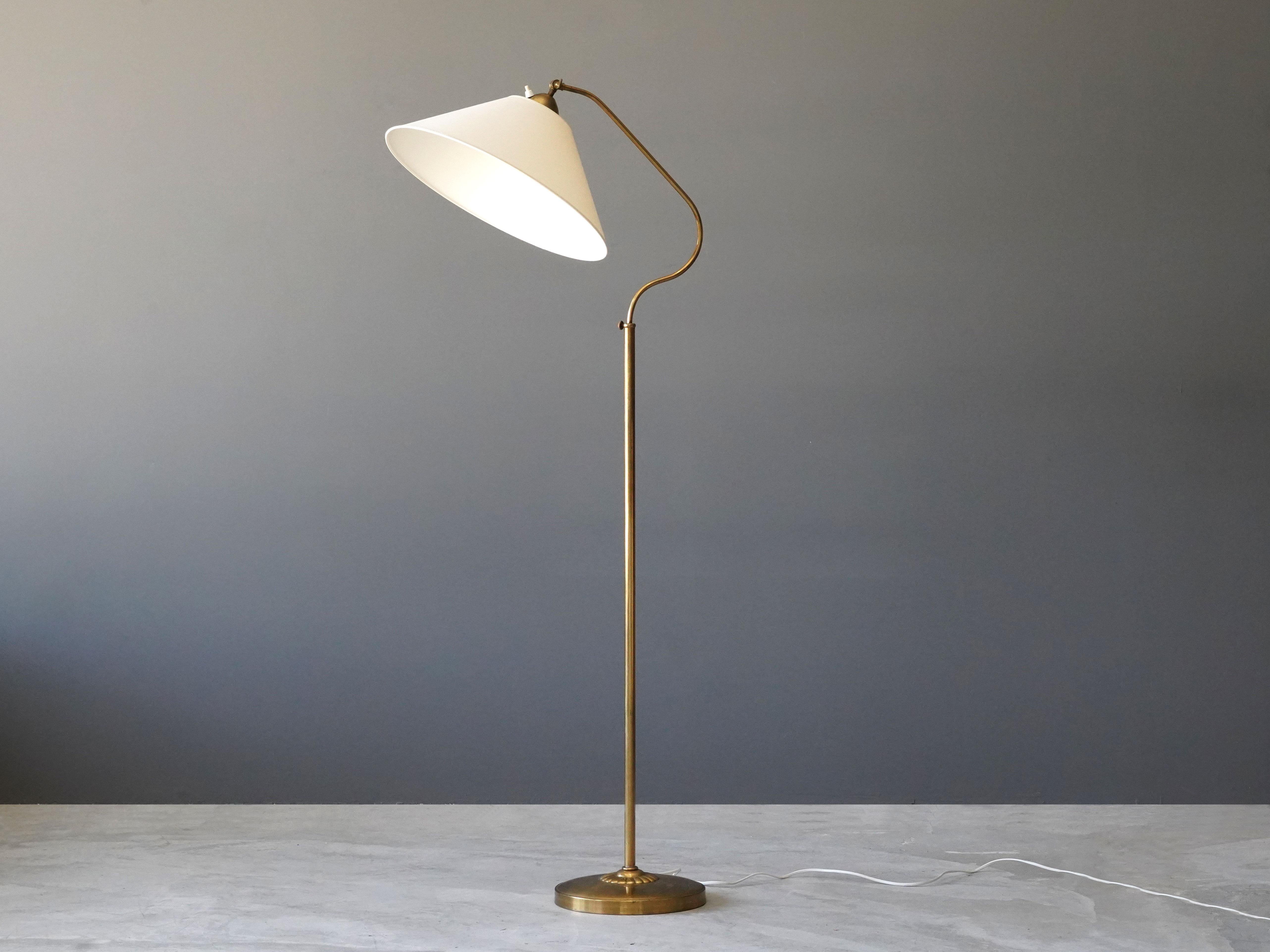 A functionalist floor lamp, adjustable organic arm. Executed in brass, with a custom vintage screen in very good original condition. 

Dimensions variable. Measured as illustrated in the first image.

Other designers of the period include Hans