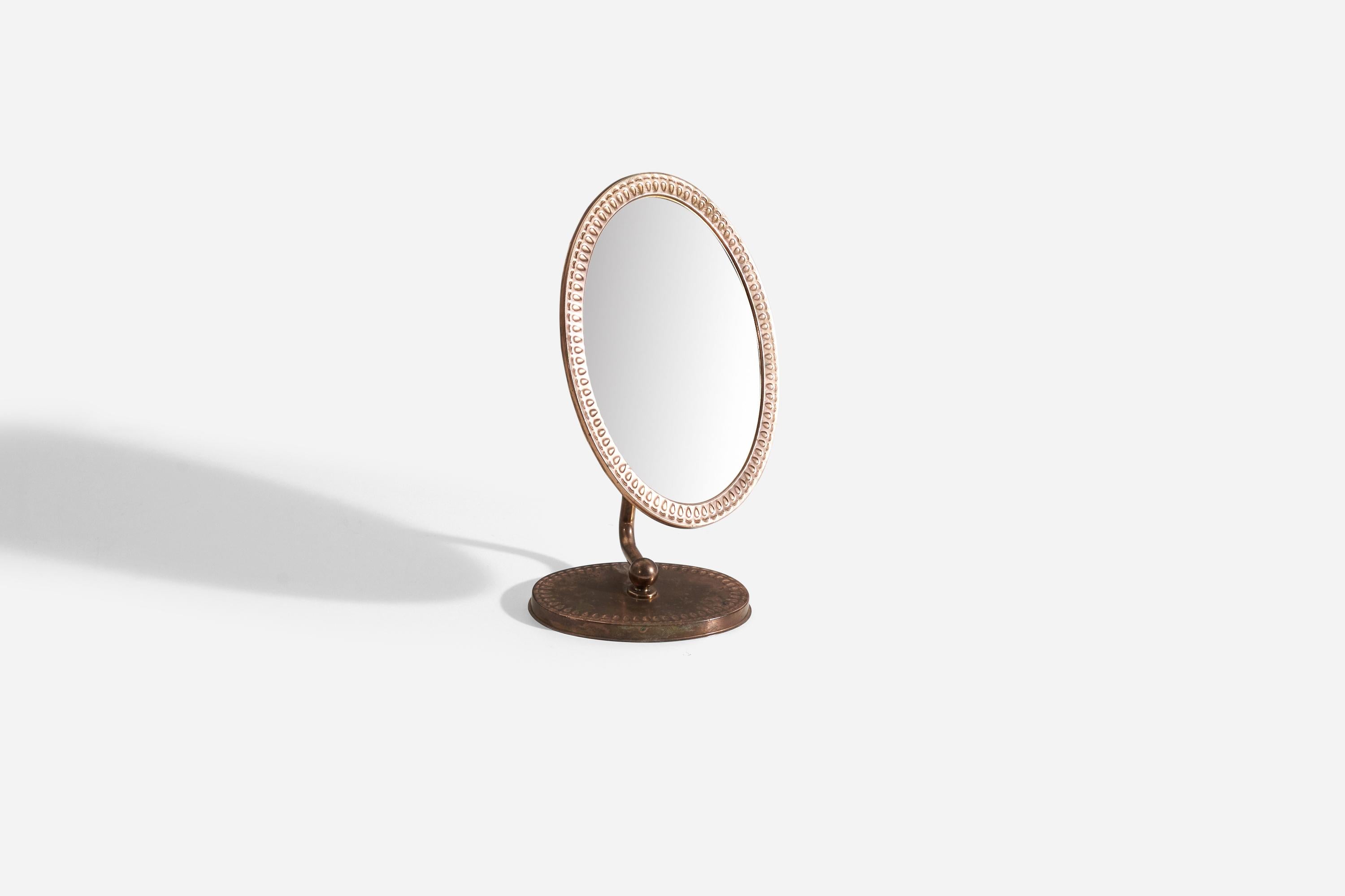 An adjustable copper table mirror designed and produced in Sweden, c. 1950s-1960s.