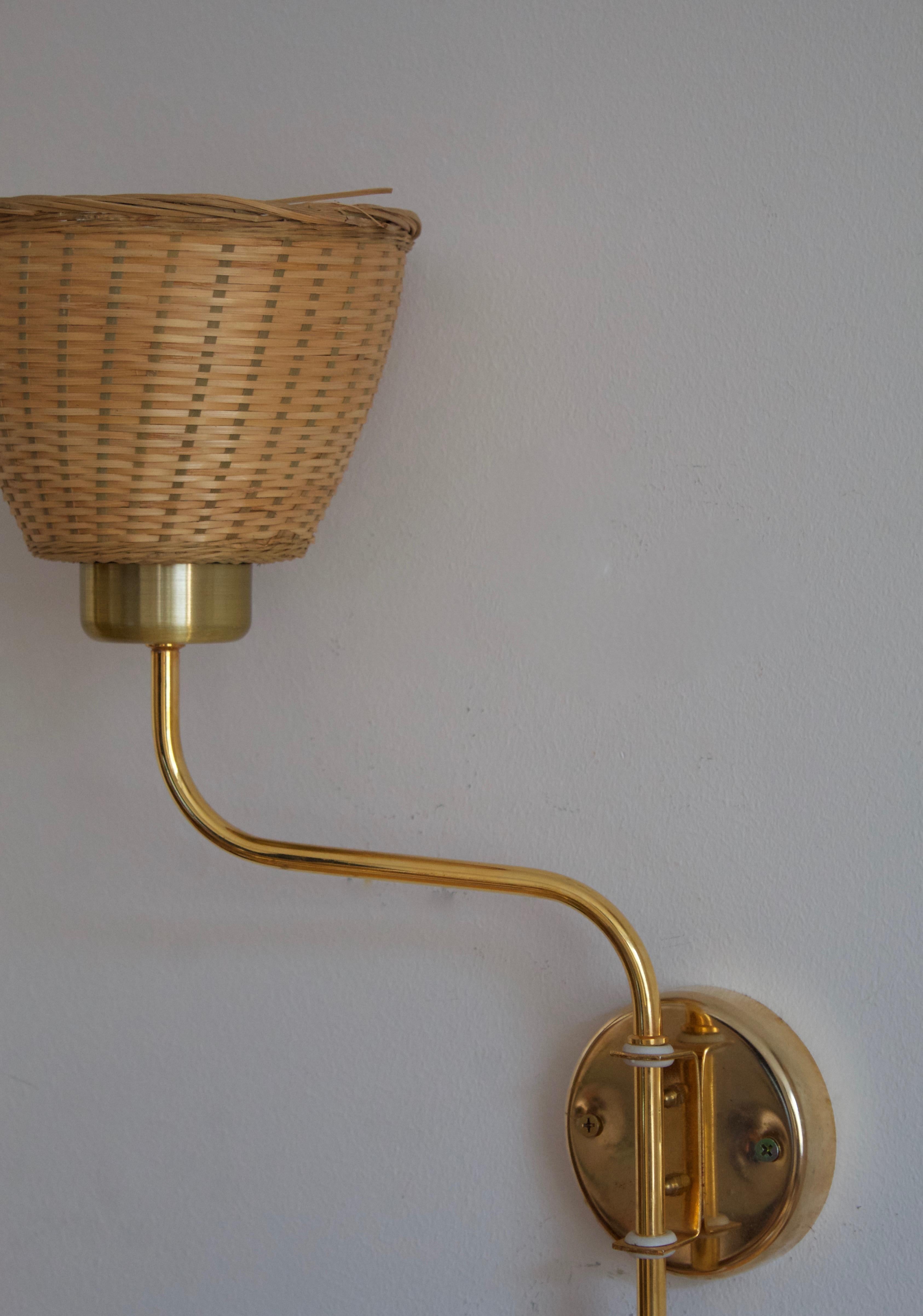 Danish Swedish Designer, Adjustable Wall Lights, Brass, Rattan, Sweden, 1970s