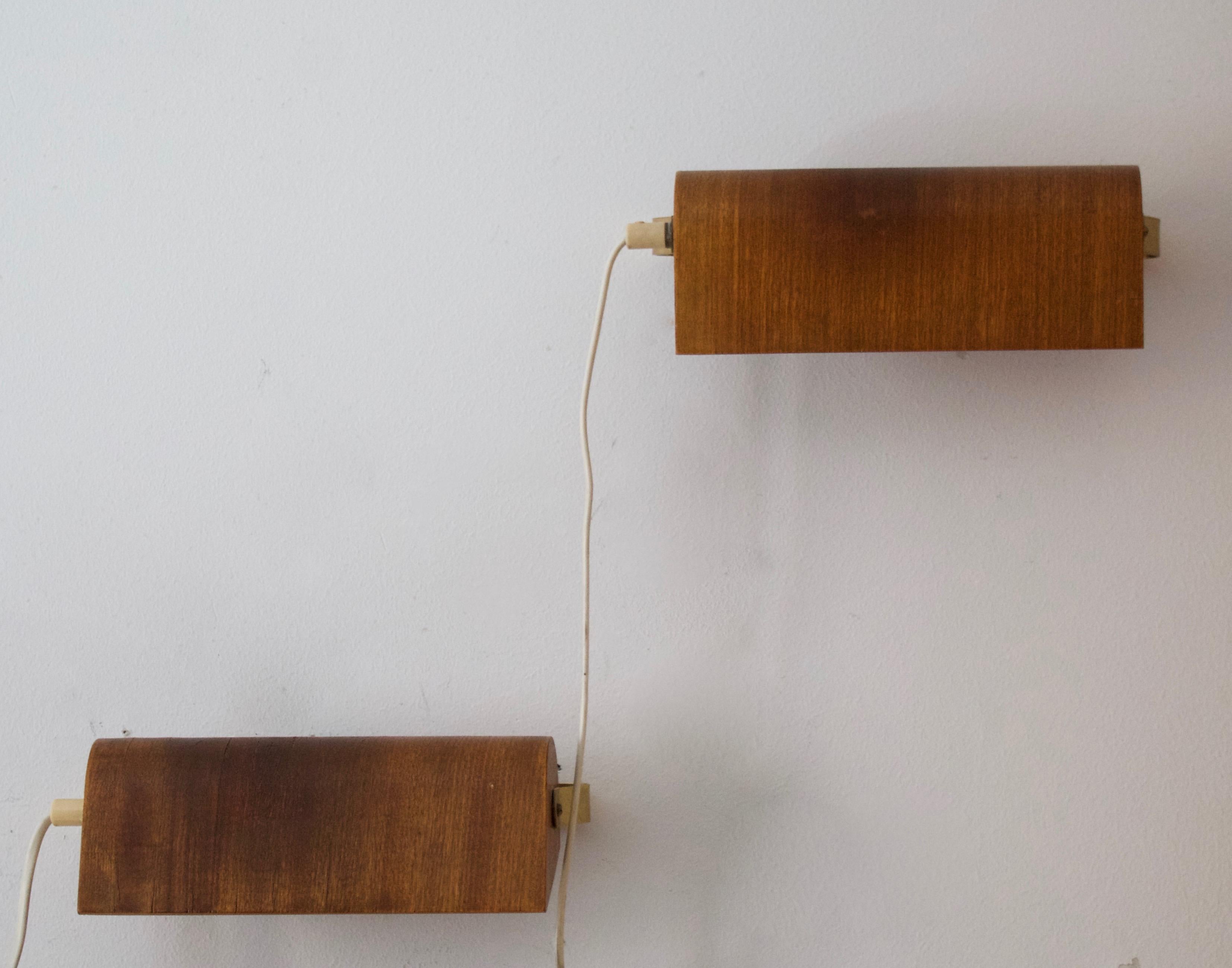 Mid-Century Modern Swedish Designer, Adjustable Wall Lights, Brass, Teak, Sweden, 1950s For Sale