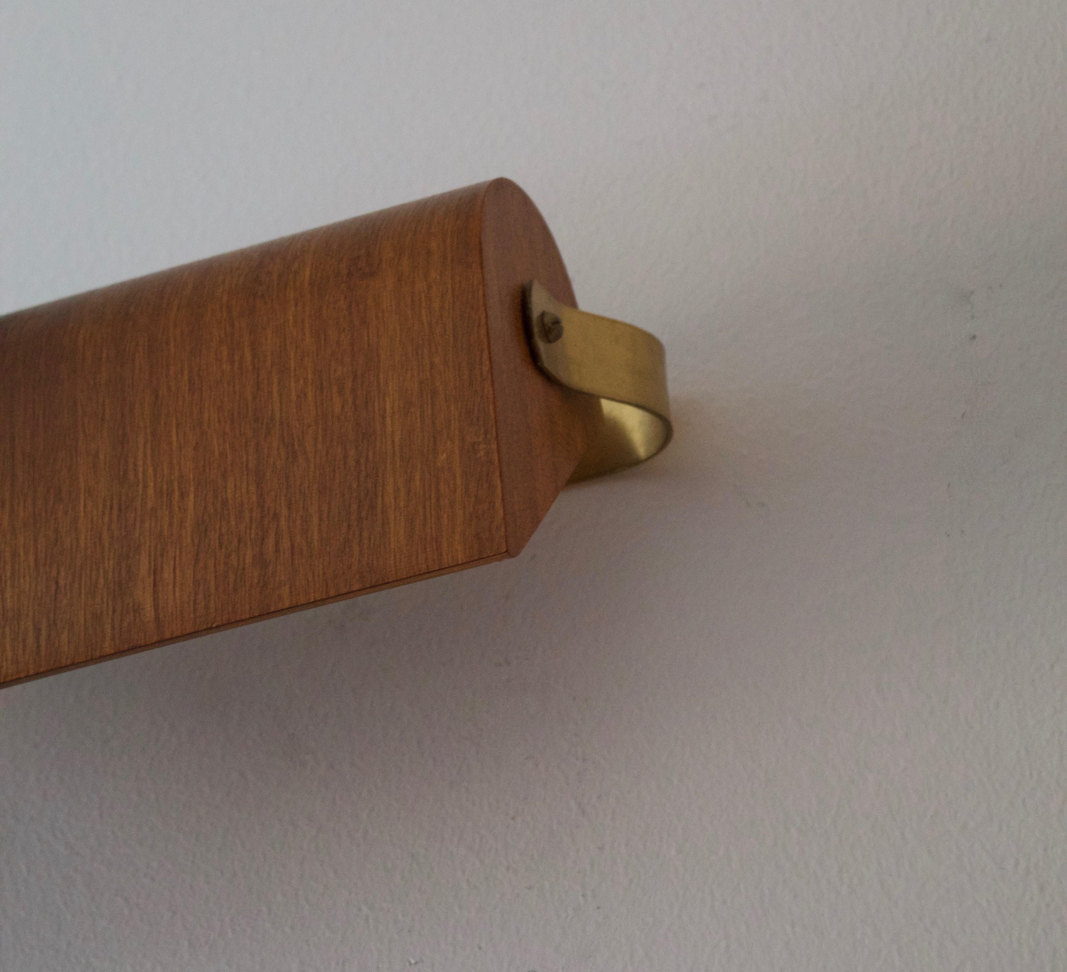 Swedish Designer, Adjustable Wall Lights, Brass, Teak, Sweden, 1950s In Good Condition For Sale In High Point, NC