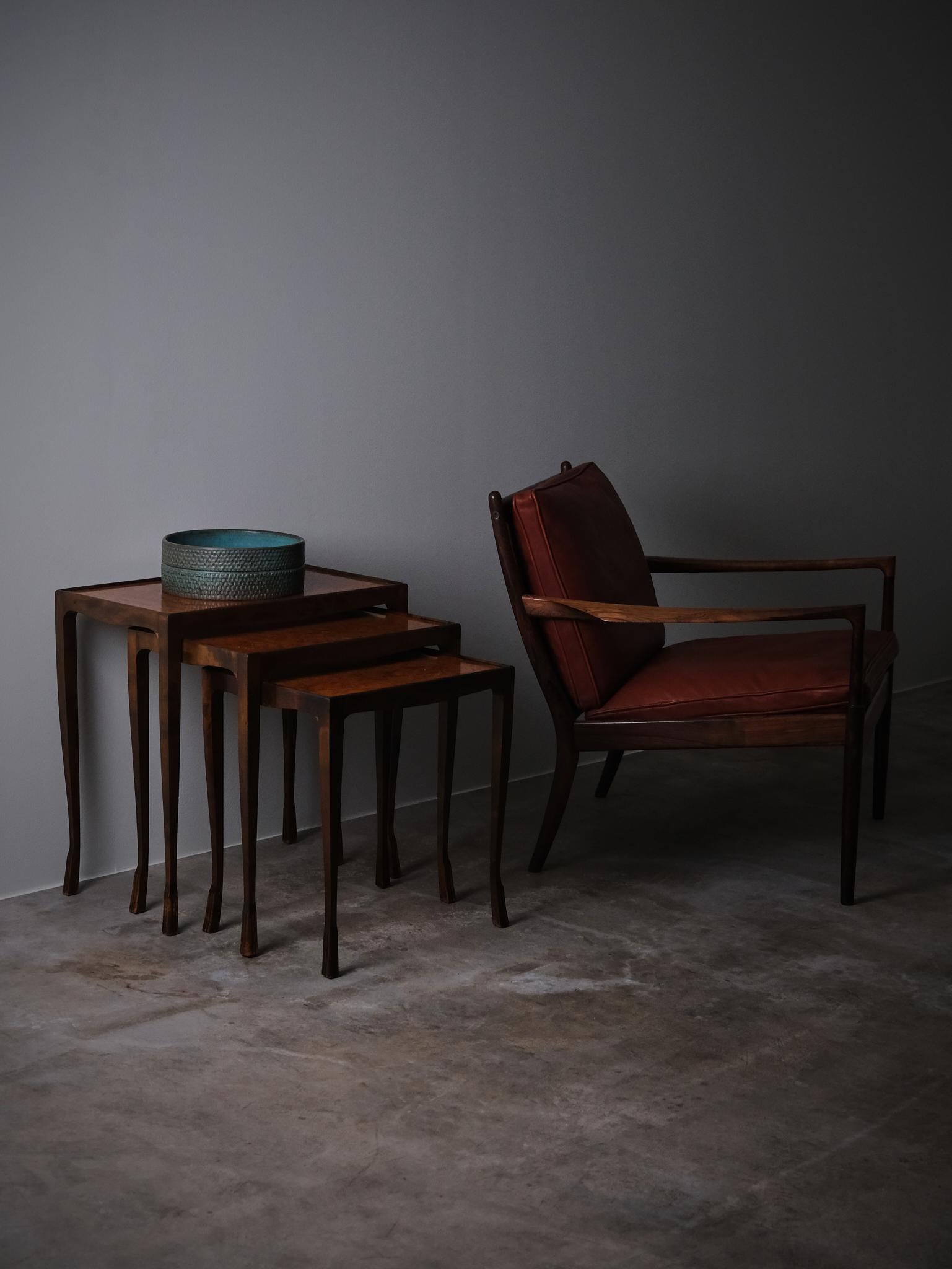 Elegant set of nesting tables by anonymous designer in Sweden during the first half of the 20th century. 

Body of birch with beautiful top of alder root. Slender legs with sculpted feets. 