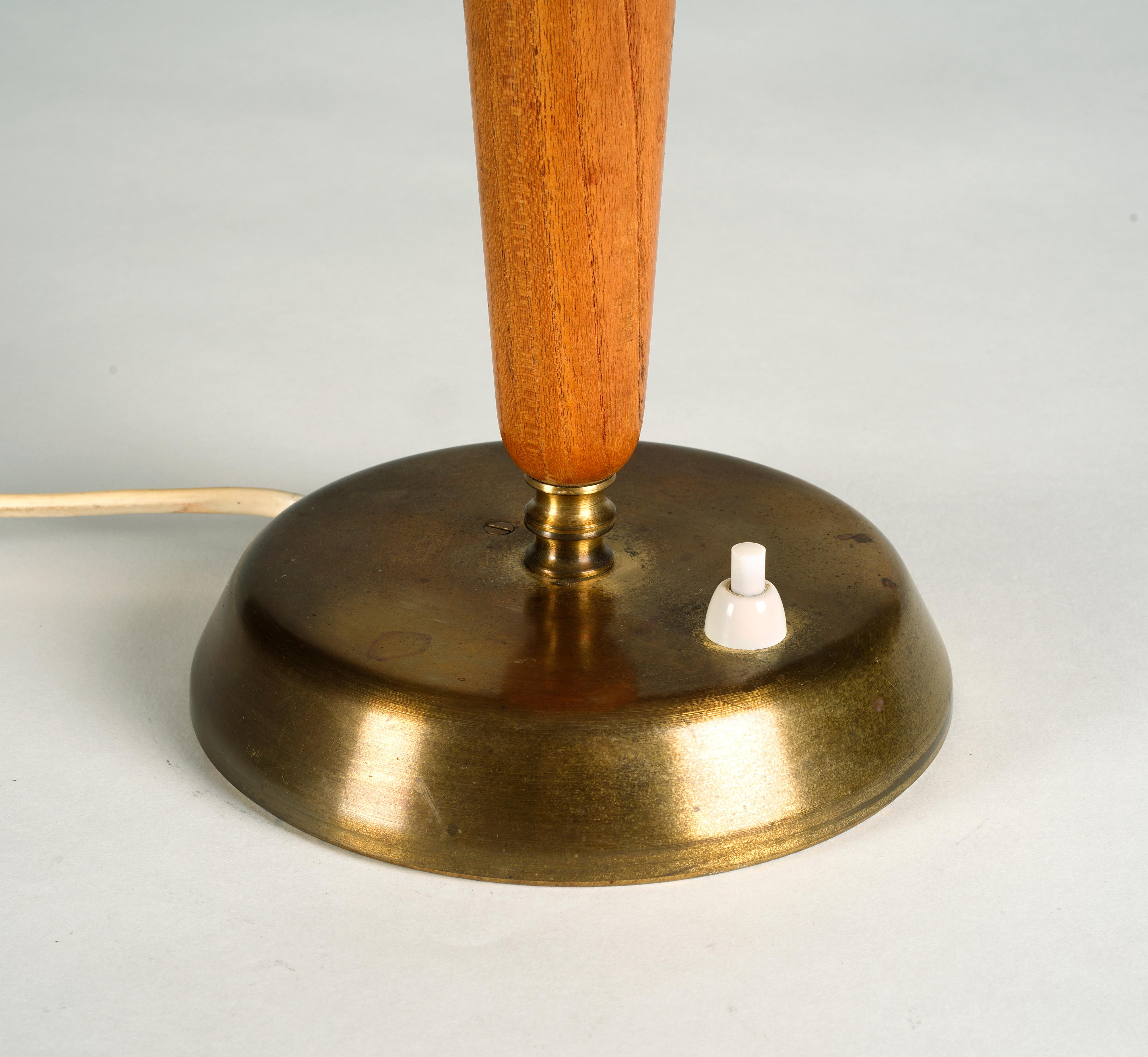 Scandinavian Modern Swedish designer, ASEA desk lamp in brass and stained elm, 1940s For Sale