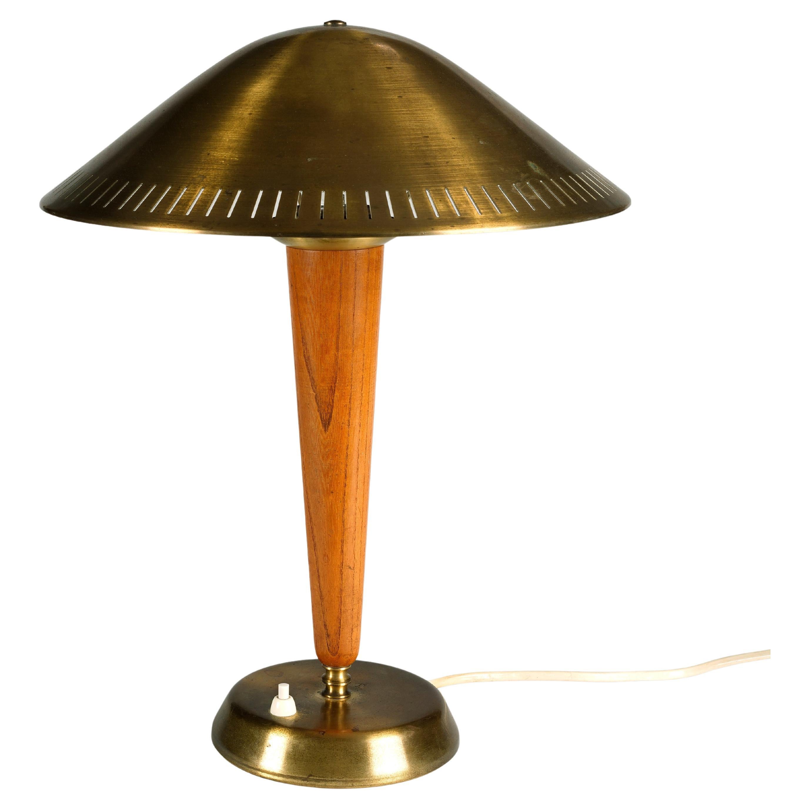 Swedish designer, ASEA desk lamp in brass and stained elm, 1940s