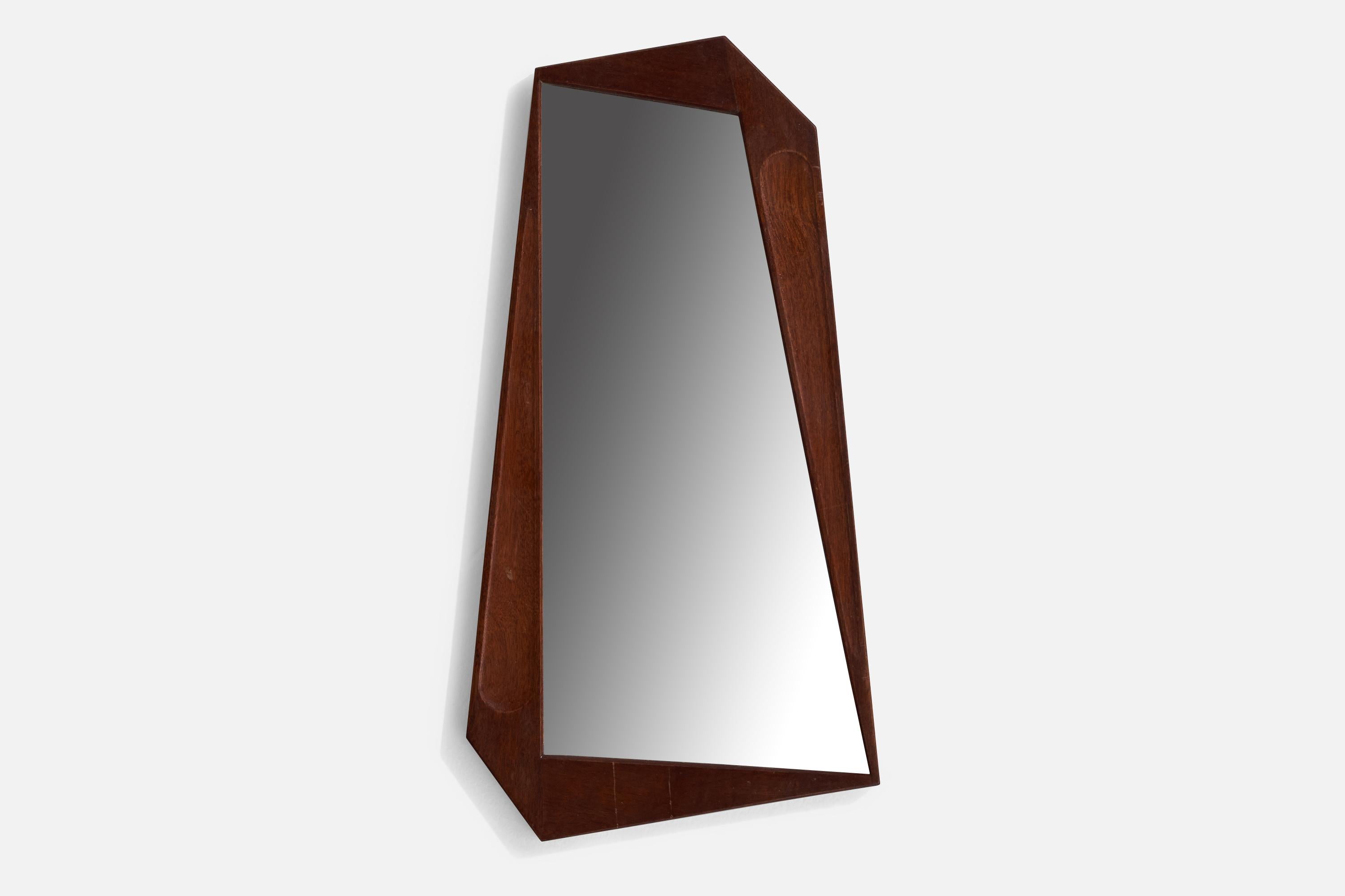 A small asymmetric teak wall mirror designed and produced in Sweden, c. 1950s.

