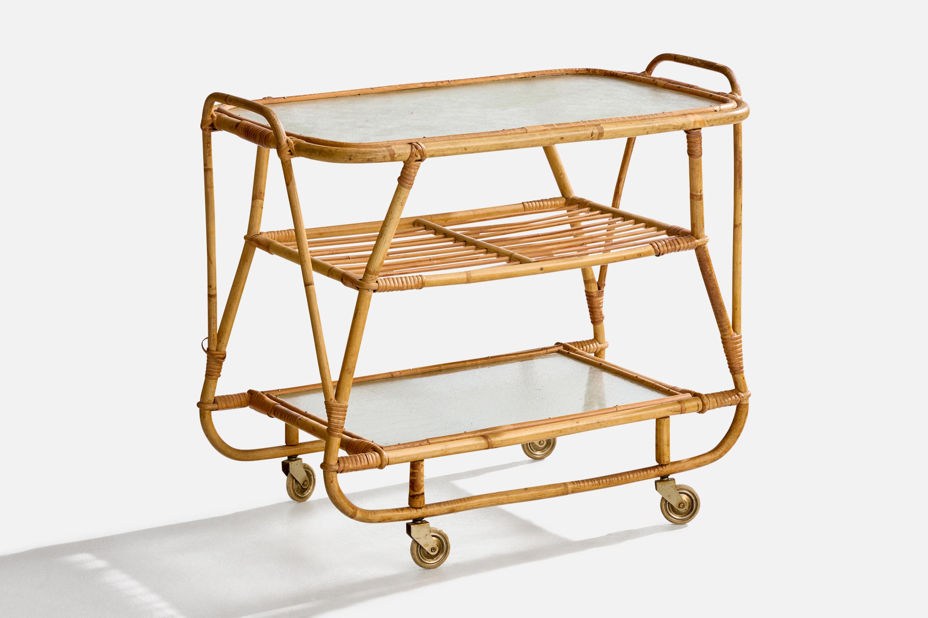 A bamboo, rattan, glass and metal bar cart designed and produced in Sweden, c. 1950s.

Overall Dimensions (inches): 24.75