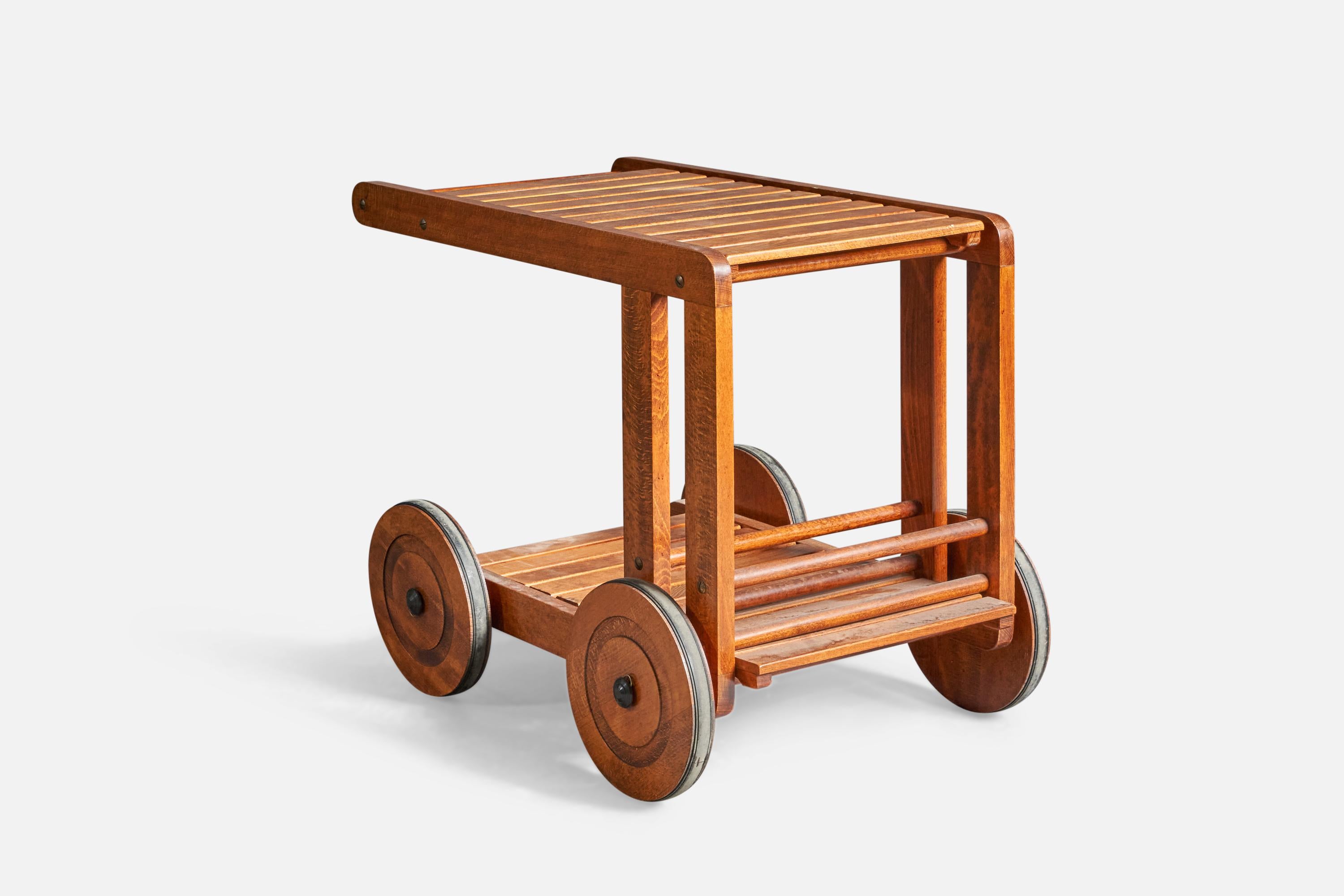 A wood and metal bar cart or drink trolley, designed and produced in Sweden, c. 1970s.