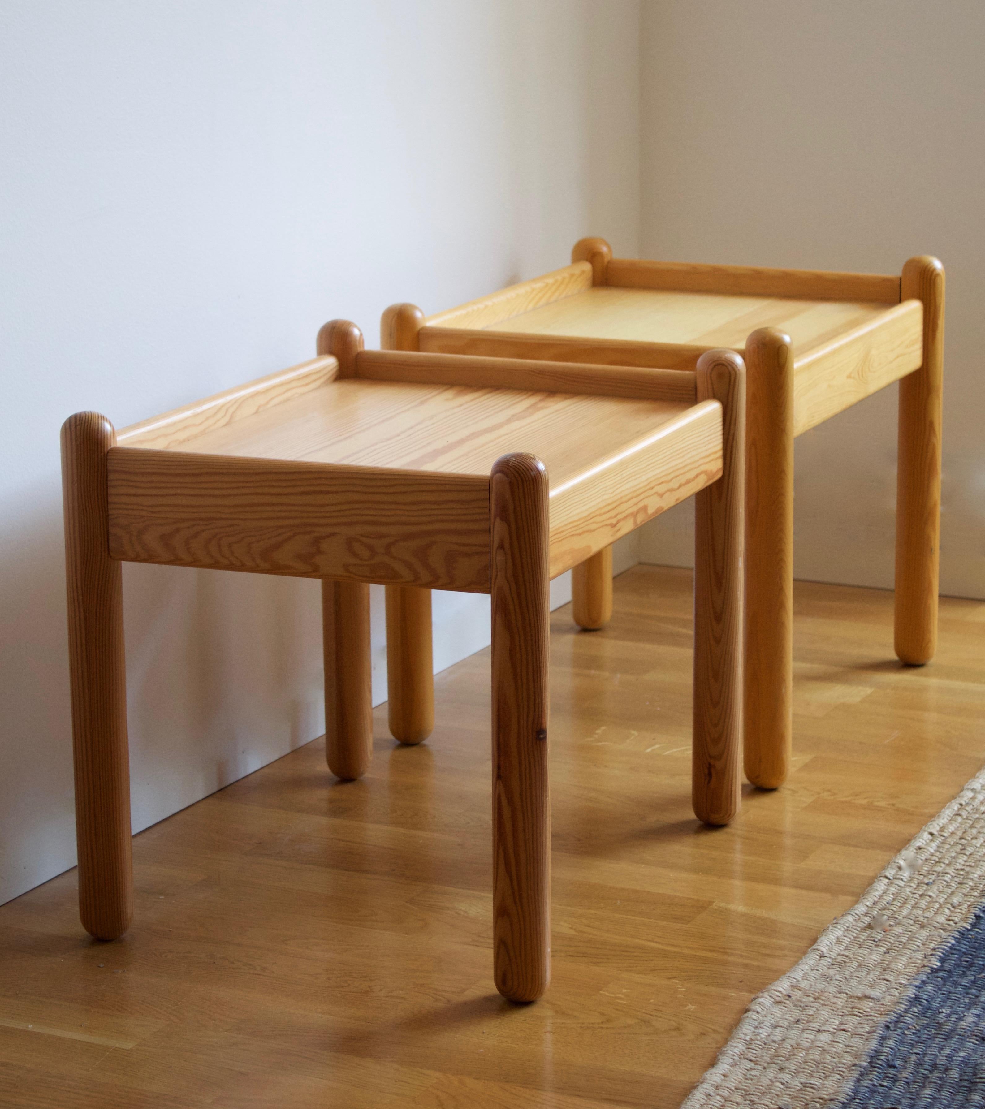 A set of side tables or bedside tables / nightstands. Designed and produced in Sweden, 1970s. In solid pine.

Other designers working in similar style and materials include Axel Einar Hjorth, Roland Wilhelmsson, Pierre Chapo, and Charlotte