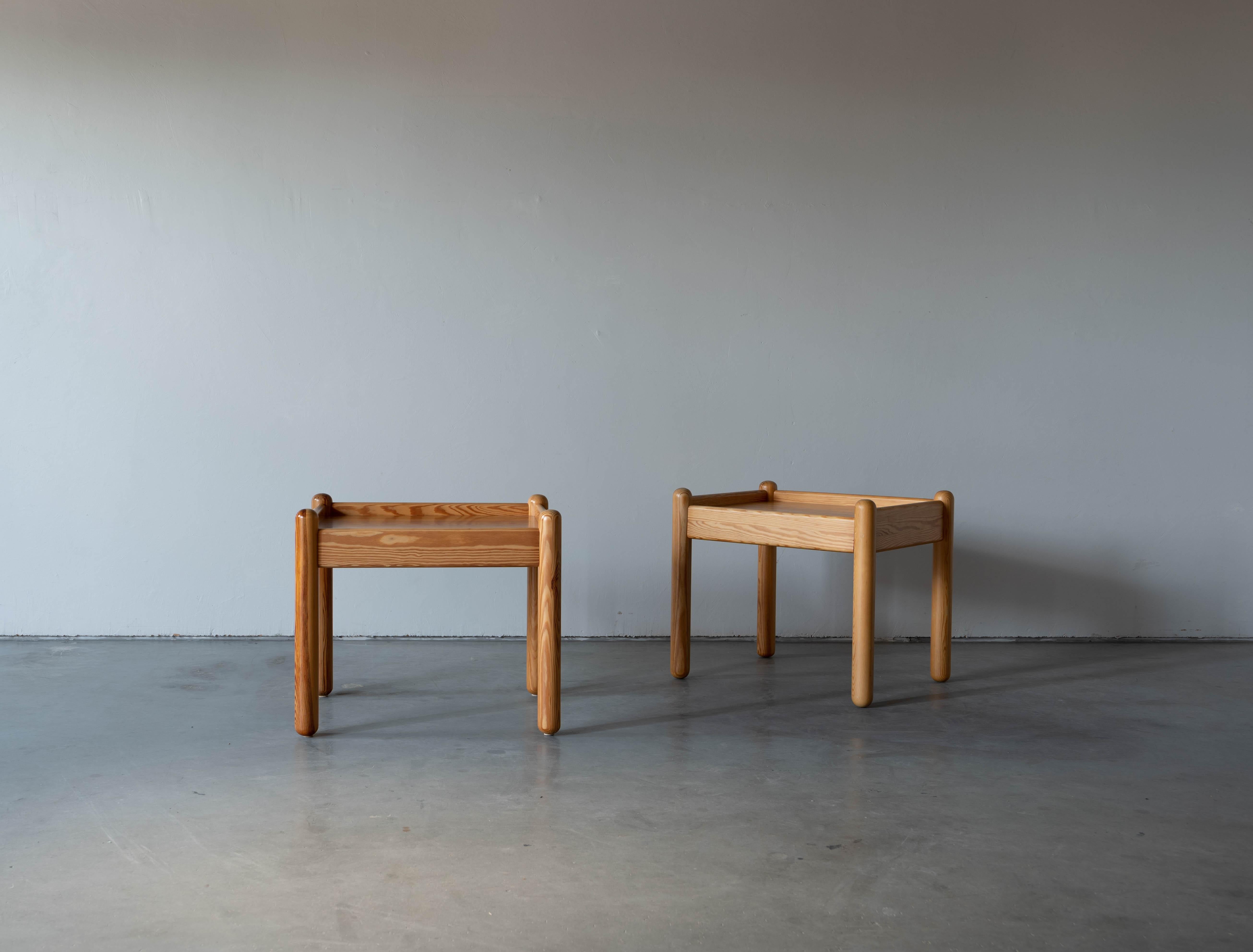 A set of side tables or bedside tables / nightstands. Designed and produced in Sweden, 1970s. In solid pine.

