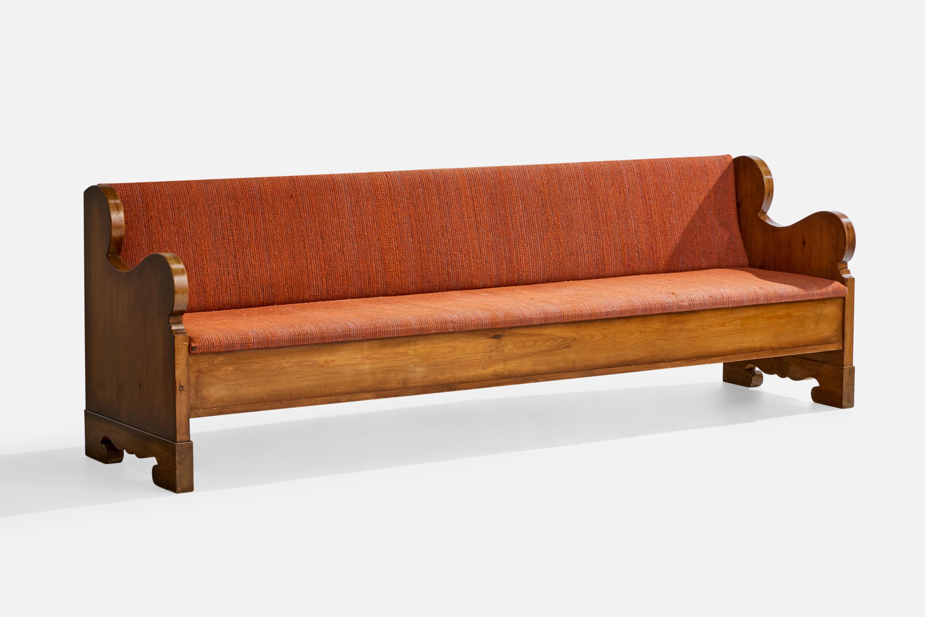A large pine and red fabric bench designed and produced in Sweden, c. 1940s.

Wear to wood consistent with age and use

Vintage fabric in distressed condition. 

Tearing present to vintage fabric.

Wear consistent with age and use

Overall