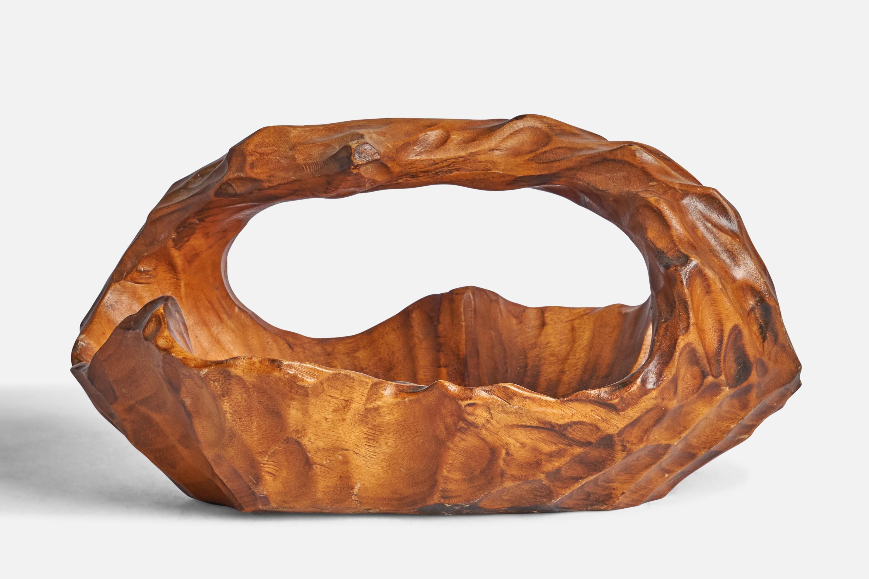 A carved burl wood bowl or basket designed and produced in Sweden, c. 1960s.