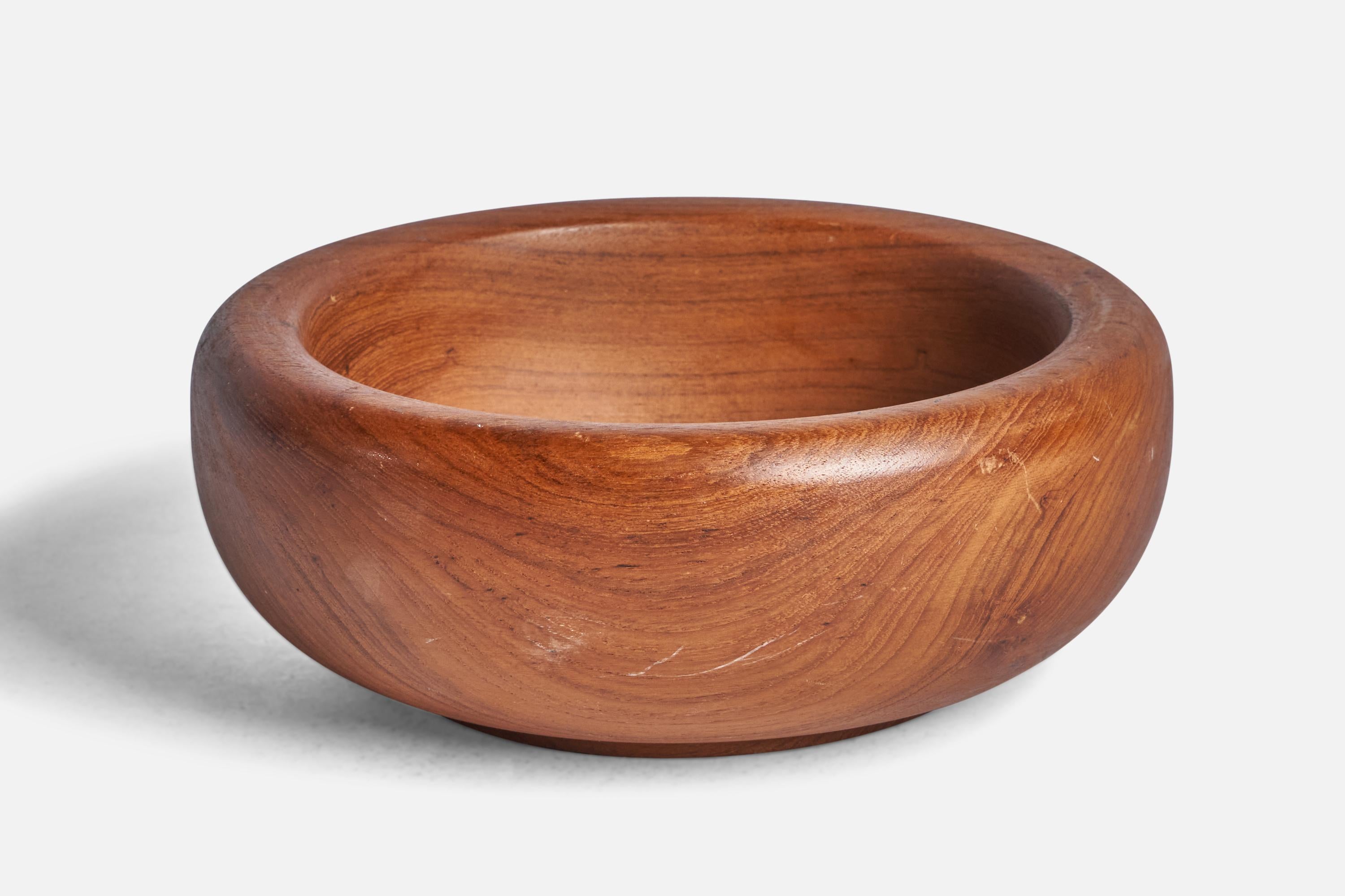A teak bowl designed and produced in Sweden, c. 1950s.