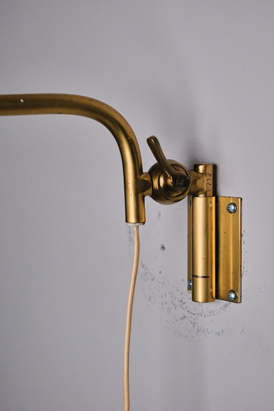 Brass Swedish designer brass wall lamp by Boréns, 1940s
