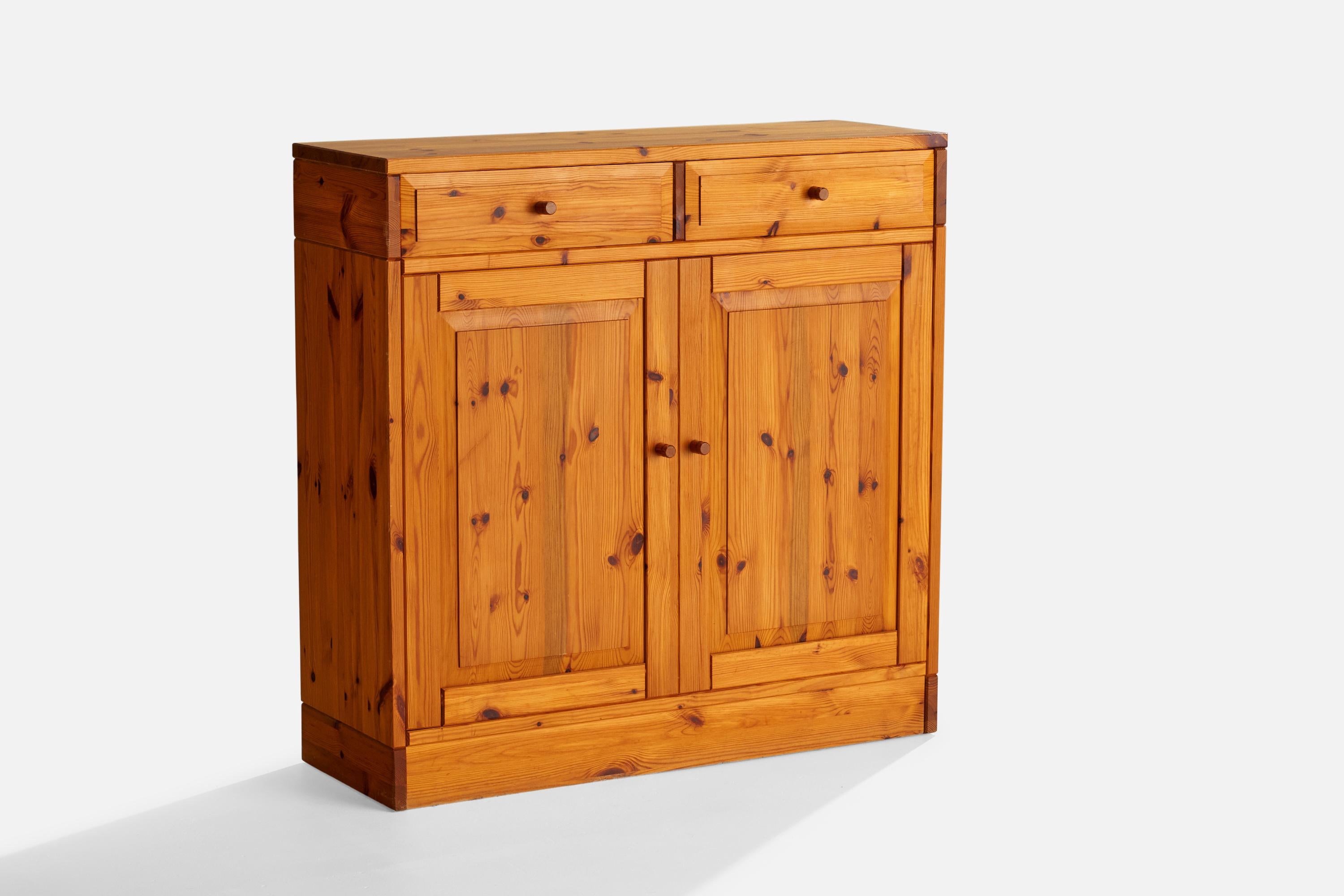 A pine cabinet designed and produced in Sweden, c. 1970s.