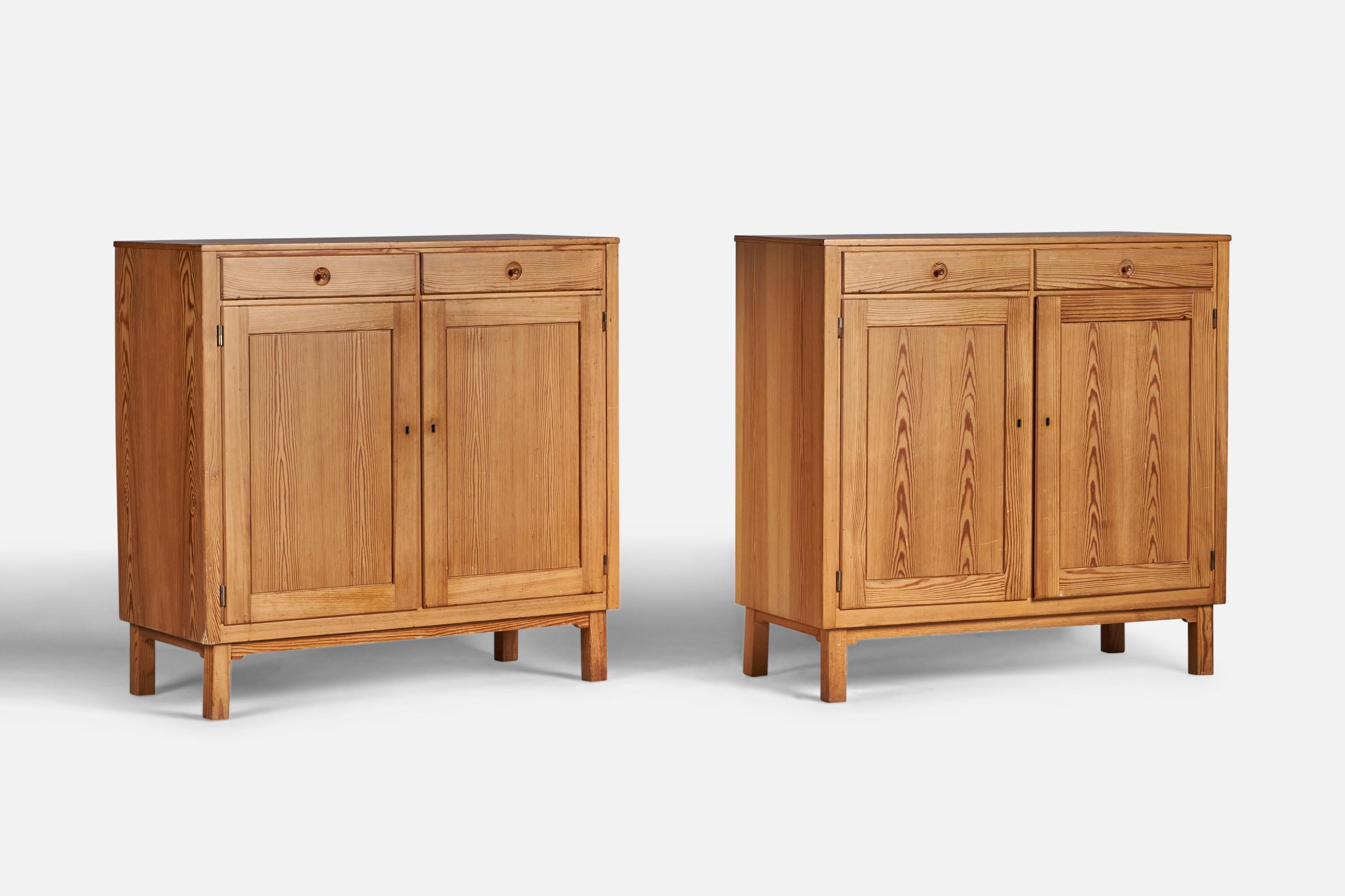 A pair of pine cabinets designed and produced in Sweden, 1960s.