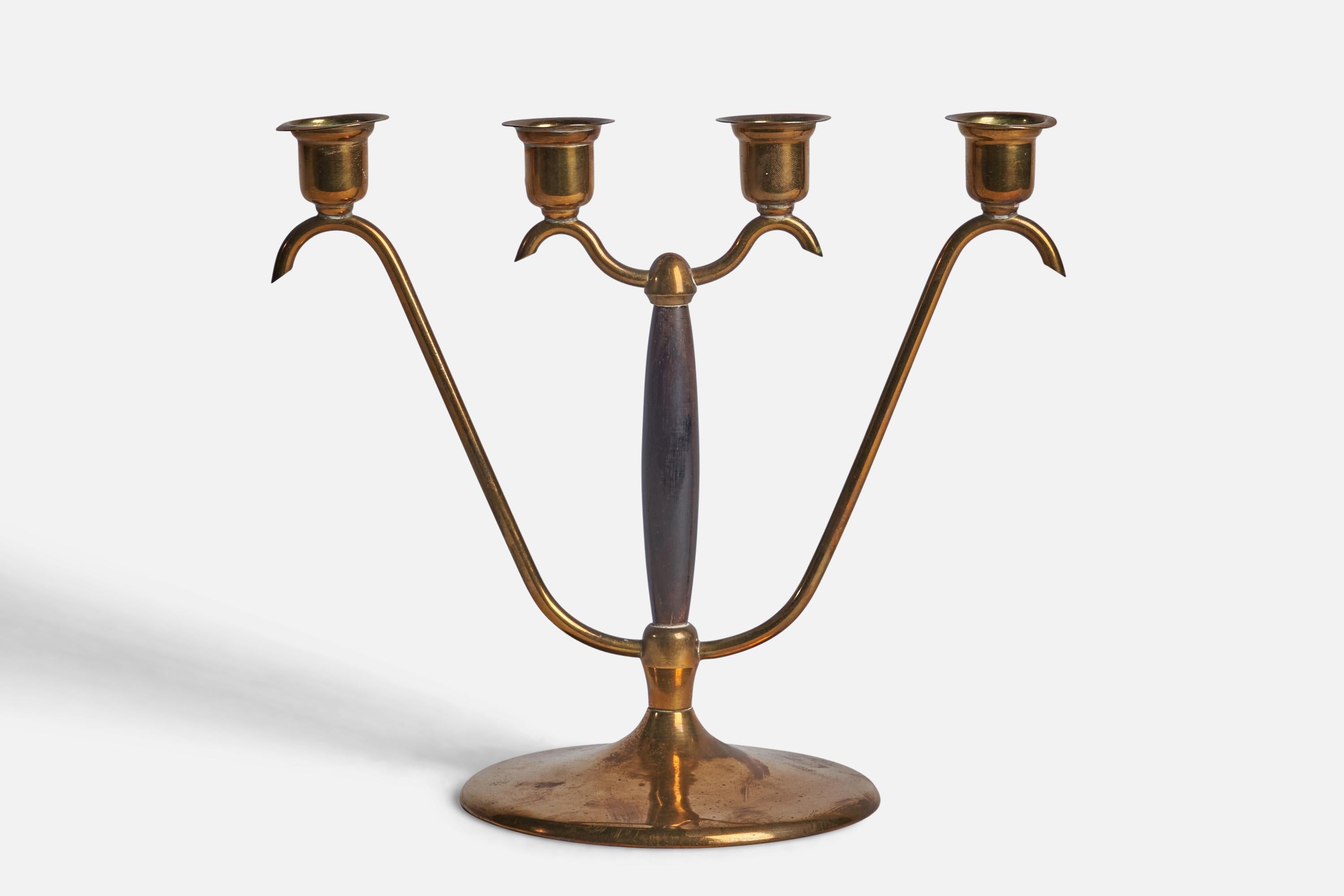 A brass and black-lacquered wood candelabra designed and produced in Sweden, 1940s.

Holds 0.8” candles