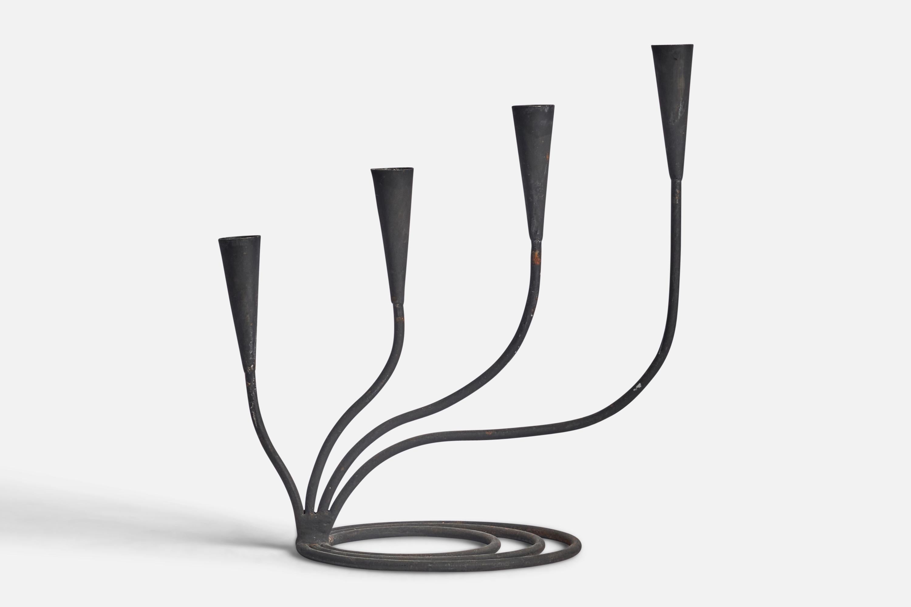 A black-painted iron candelabra designed and produced in Sweden, c. 1940s.

Fits 0.8” diameter candles