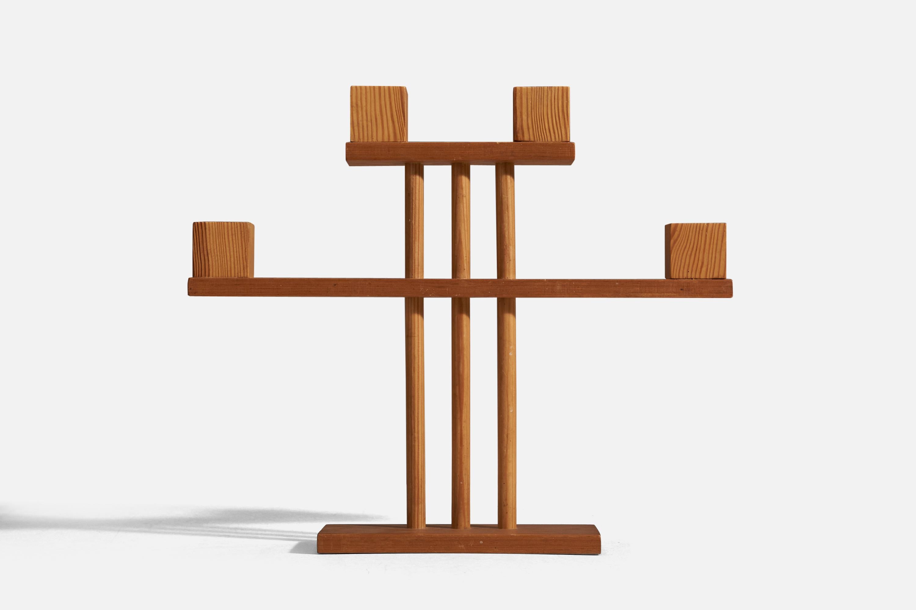 A pine candelabra designed and produced in Sweden, 1970s.