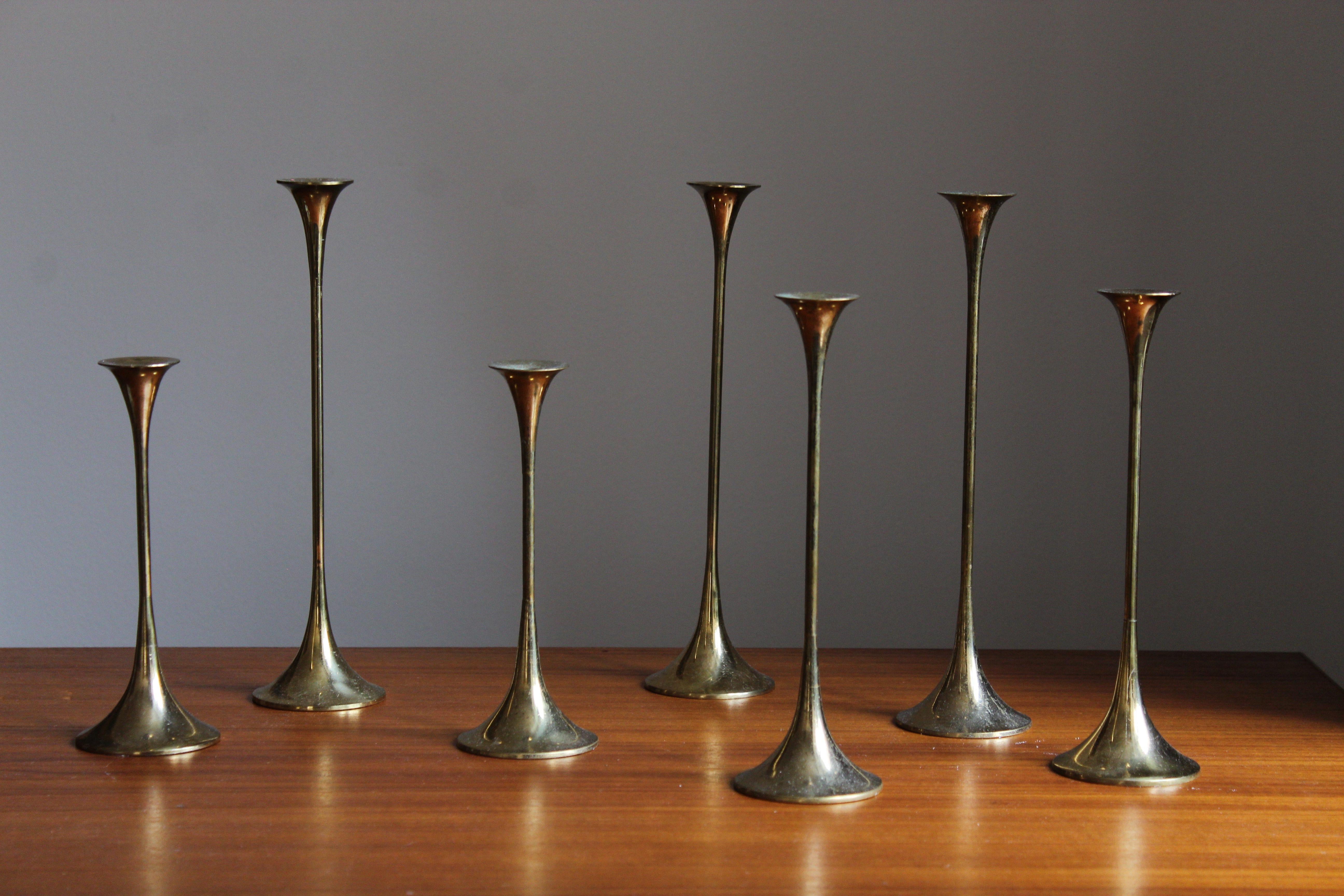 A set of 7 candlesticks. Designed and produced in Sweden, c. 1960s. For small candles.
 
  