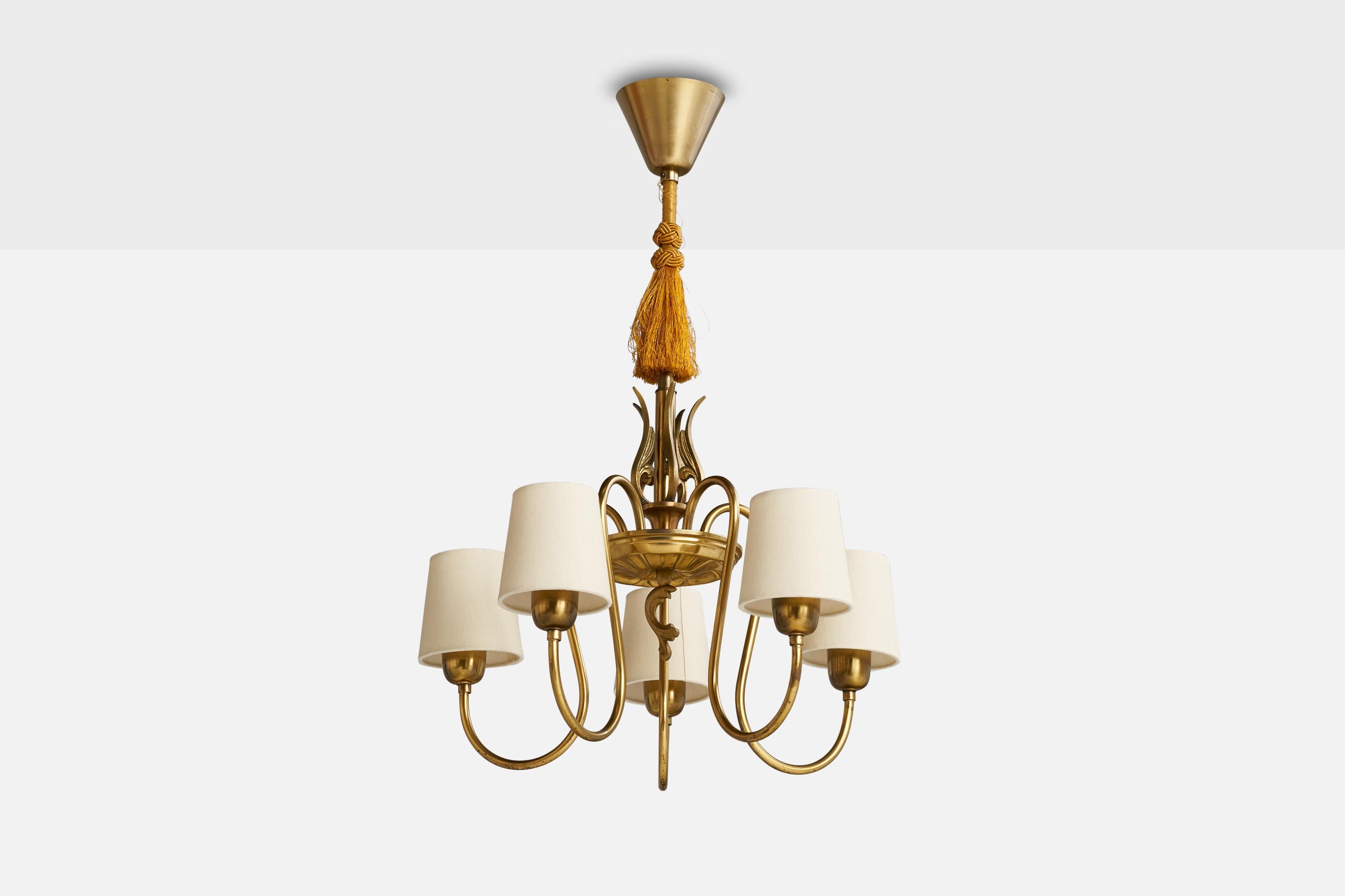 A brass, white fabric and beige string fabric chandelier designed and produced in Sweden, 1930s.

Dimensions of canopy (inches): 3.5” H x 4” Diameter
Socket takes standard E-26 bulbs. 5 sockets. There is no maximum wattage stated on the fixture. All