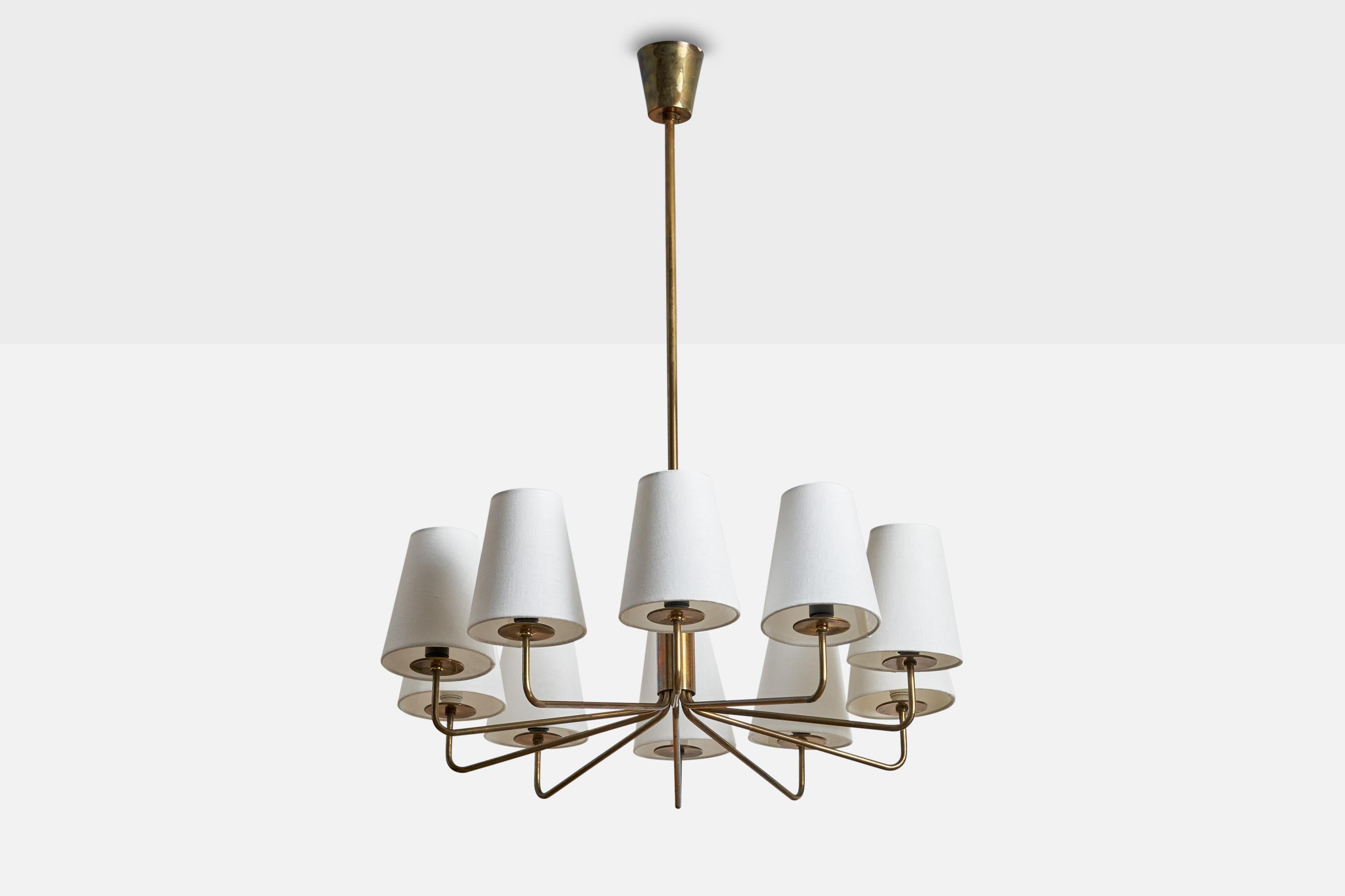 A brass and fabric chandelier designed and produced in Sweden, c. 1940s.

Dimensions of canopy (inches): 3.25” H x 3.25 Diameter
Socket takes standard E-14 bulbs. 10 sockets.There is no maximum wattage stated on the fixture. All lighting will be