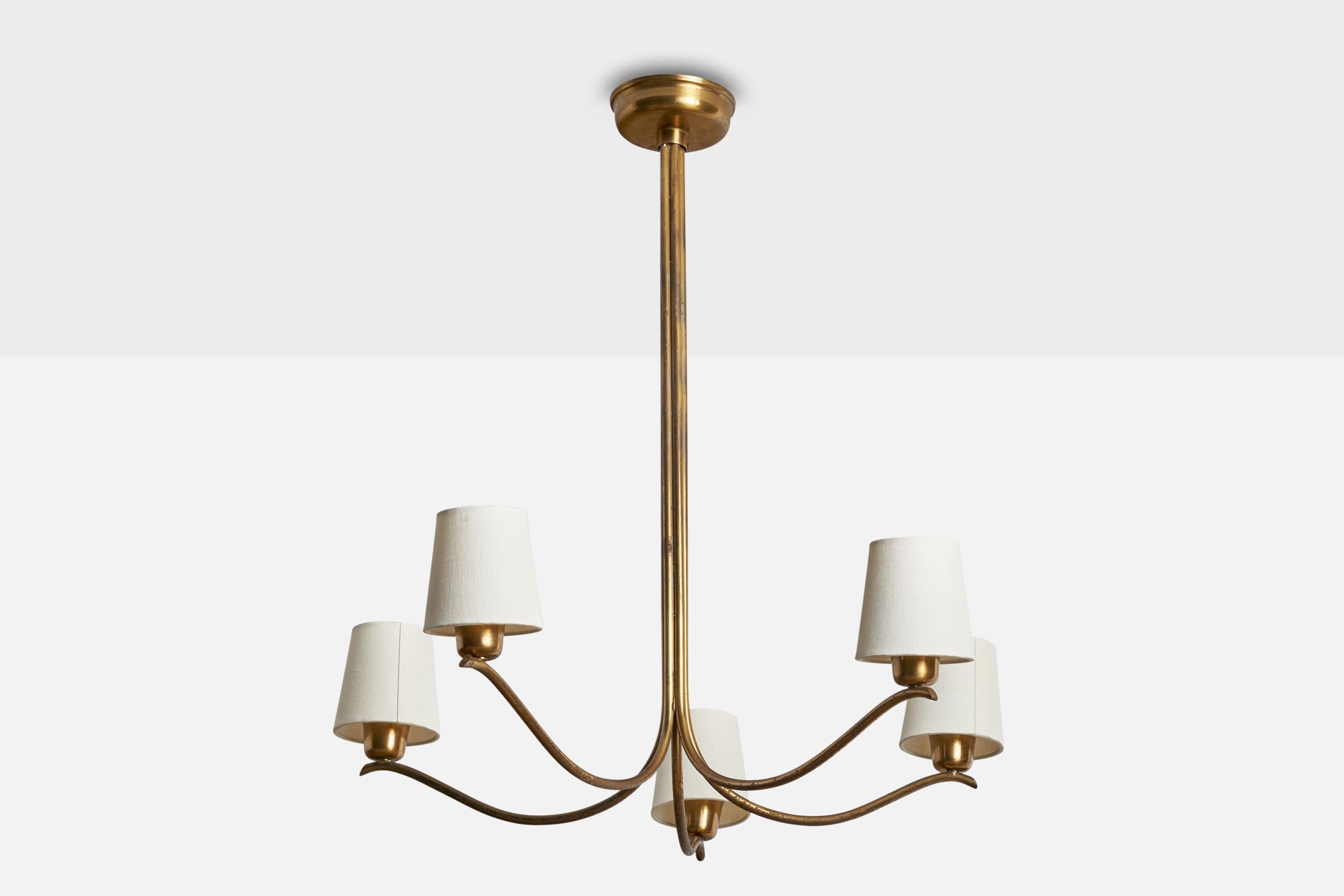 A brass and fabric chandelier designed and produced in Sweden, 1940s.

Dimensions of canopy (inches): 1.25” H x 5” Diameter
Socket takes standard E-26 bulbs. 5 sockets.There is no maximum wattage stated on the fixture. All lighting will be converted