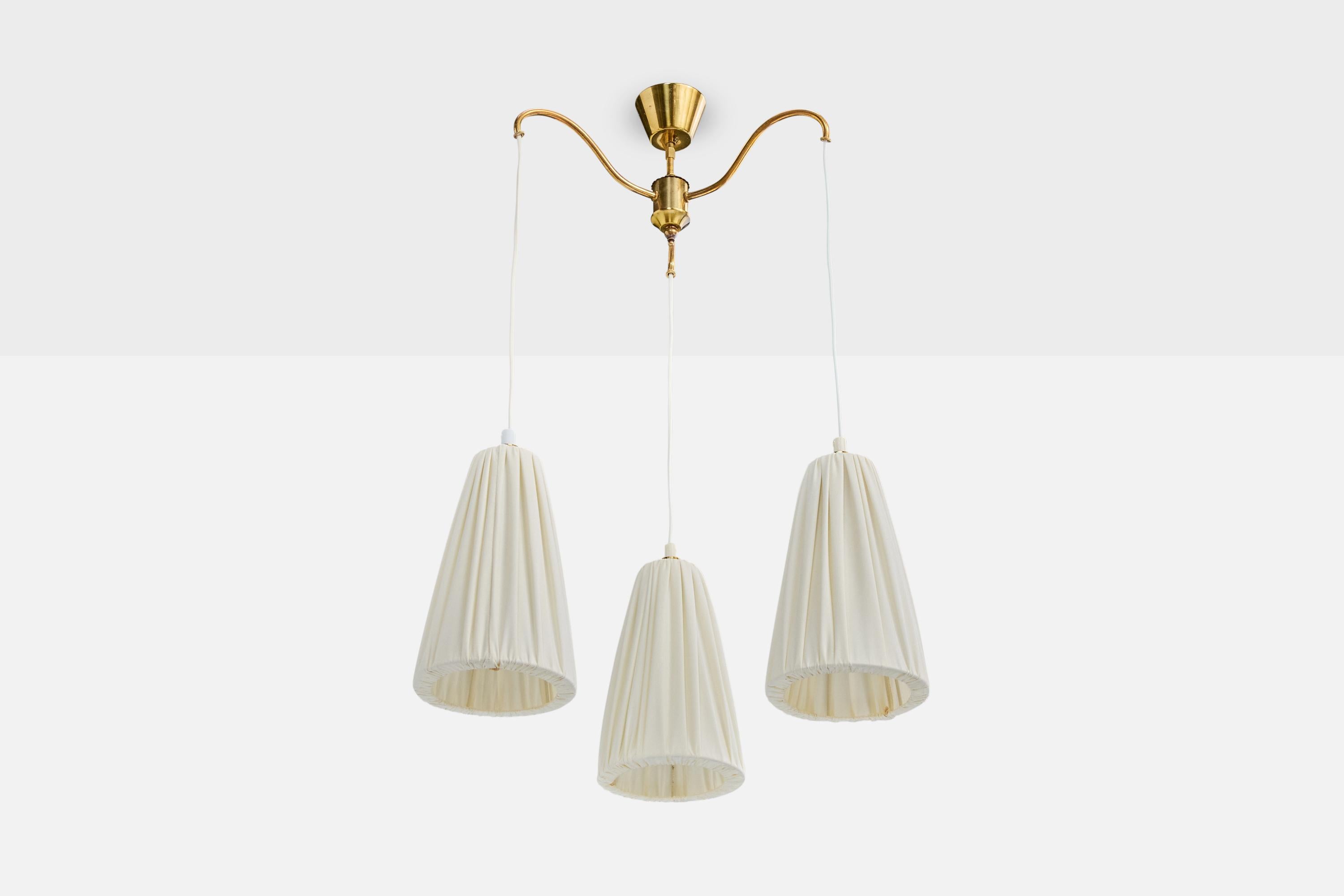 A brass and white fabric chandelier designed and produced in Sweden, c. 1950s.

Overall Dimensions (inches): 33.5