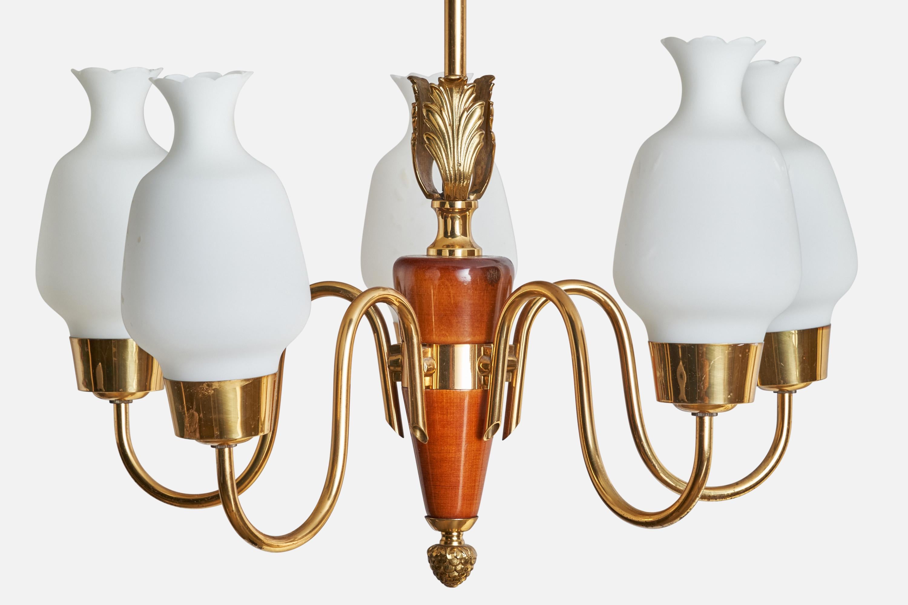 A brass, stained birch and opaline glass chandelier designed and produced in Sweden, 1940s.

Dimensions of canopy (inches): 2.5”  H x 4” Diameter
Socket takes standard E-14 bulbs. 5 sockets.There is no maximum wattage stated on the fixture. All