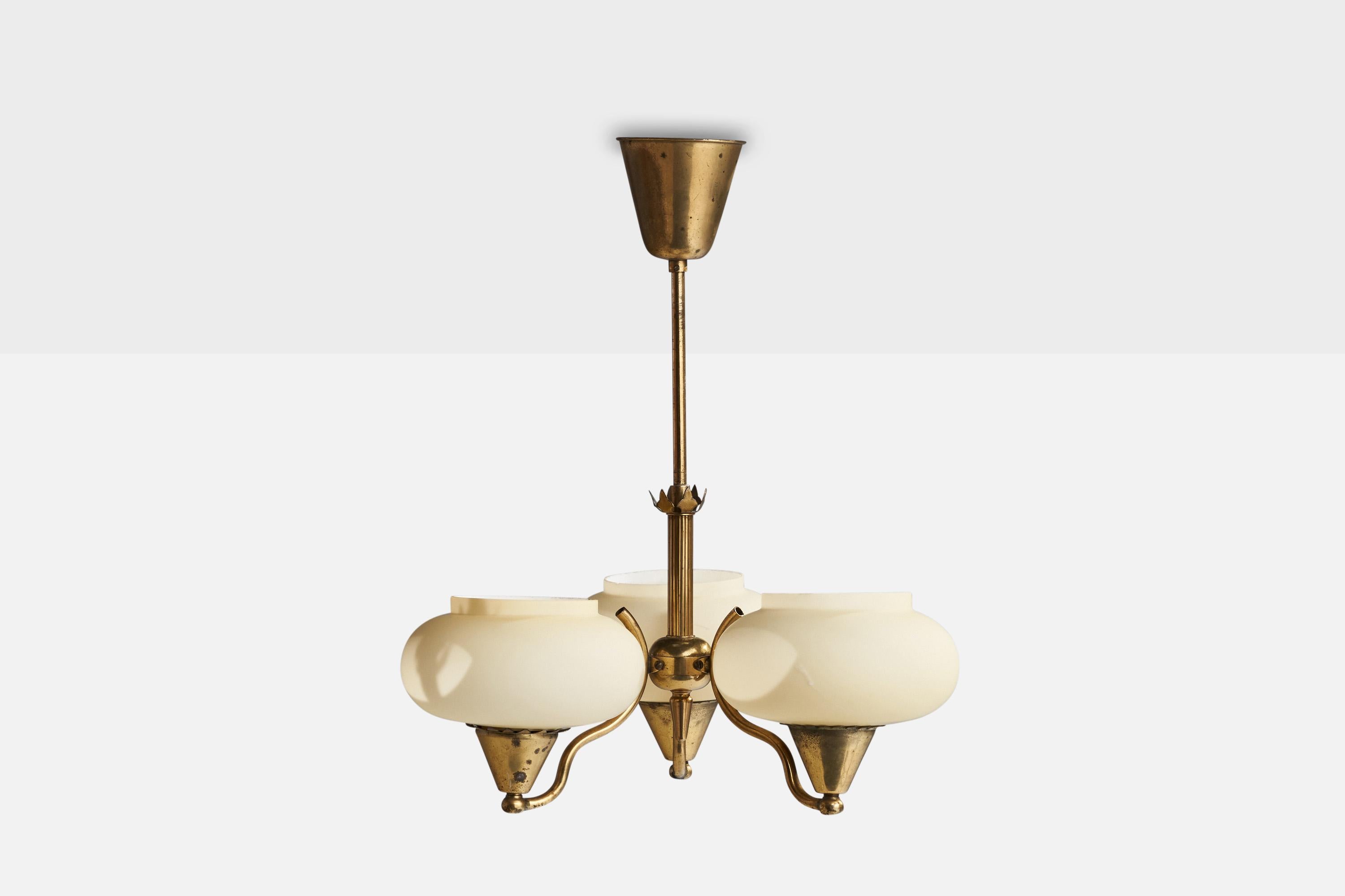 A brass and opaline glass chandelier designed and produced in Sweden, c. 1930s.

Dimensions of canopy (inches): 3.75”  H x 3.75” Diameter
Socket takes standard E-26 bulbs. 3 sockets.There is no maximum wattage stated on the fixture. All lighting