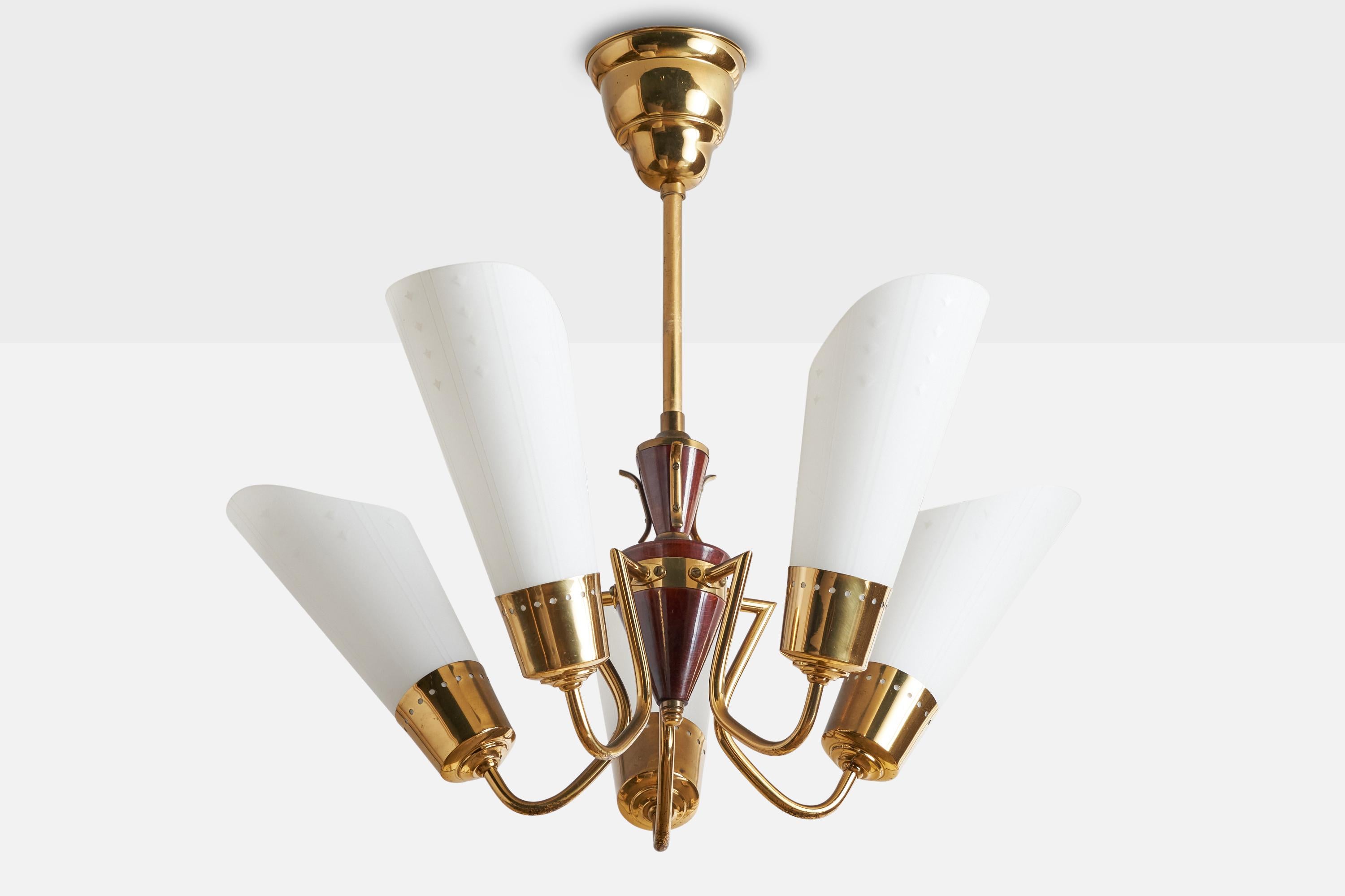 A brass, stained wood and glass chandelier designed and produced in Sweden, c. 1940s.

Dimensions of canopy (inches): 3.5”  H x 4” Diameter
Socket takes standard E-14 bulbs. 5 sockets.There is no maximum wattage stated on the fixture. All lighting