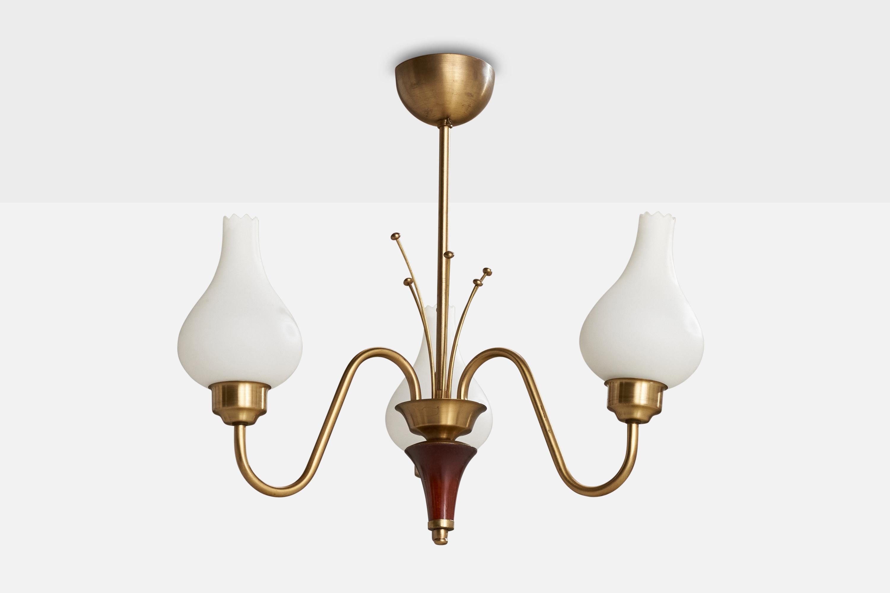 A brass, stained wood and opaline glass chandelier designed and produced in Sweden, c. 1940s.

Overall Dimensions (inches): 17” H x  16” Diameter
Dimensions of Canopy: 2.25 ” H x 3.5” D
Stem length: 2.5”H
Bulb Specifications: E-14 Bulbs
Number of