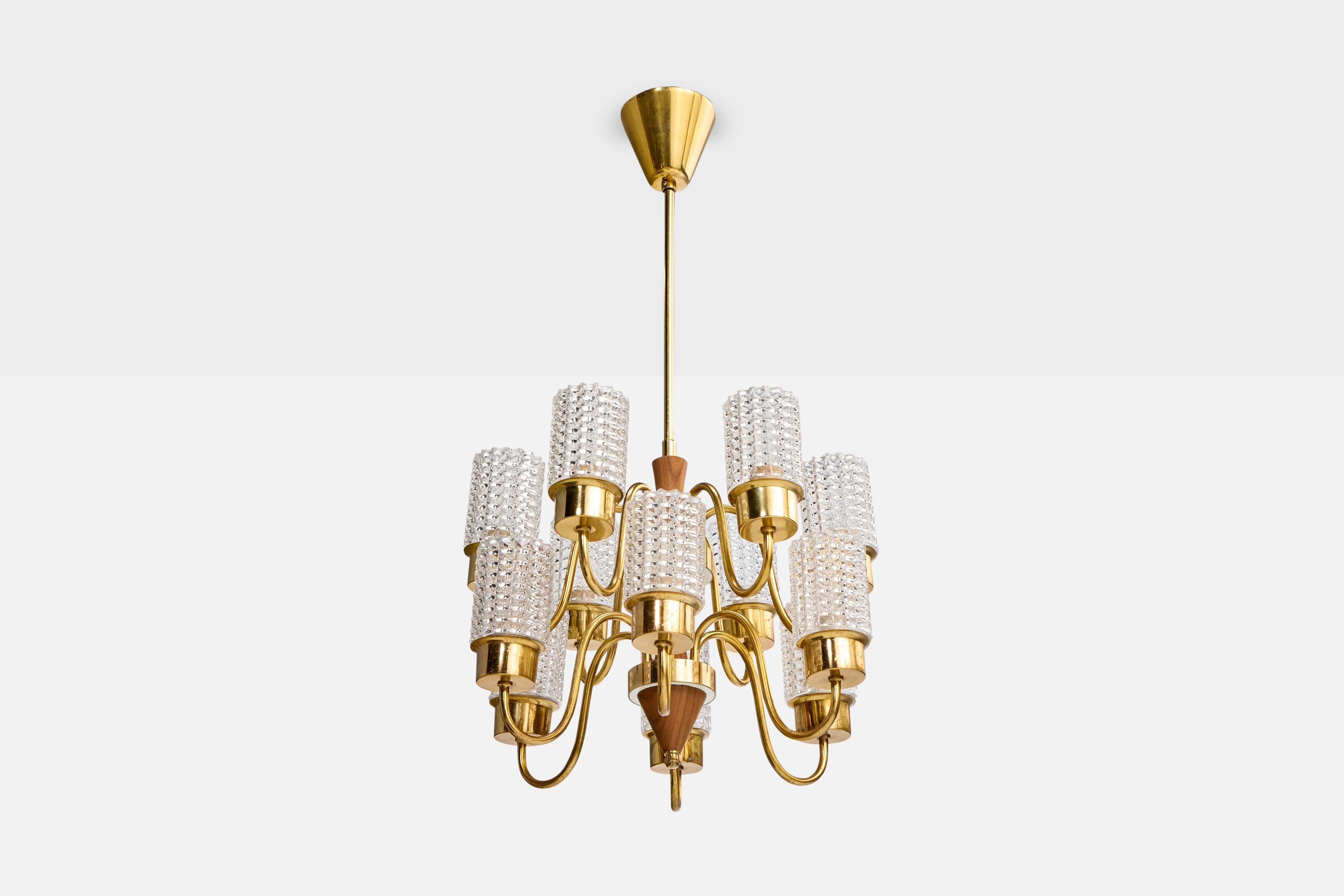 Lustre en bois, verre et laiton conçu et produit en Suède, C.1950.

Dimensions globales (pouces) : 26.0 