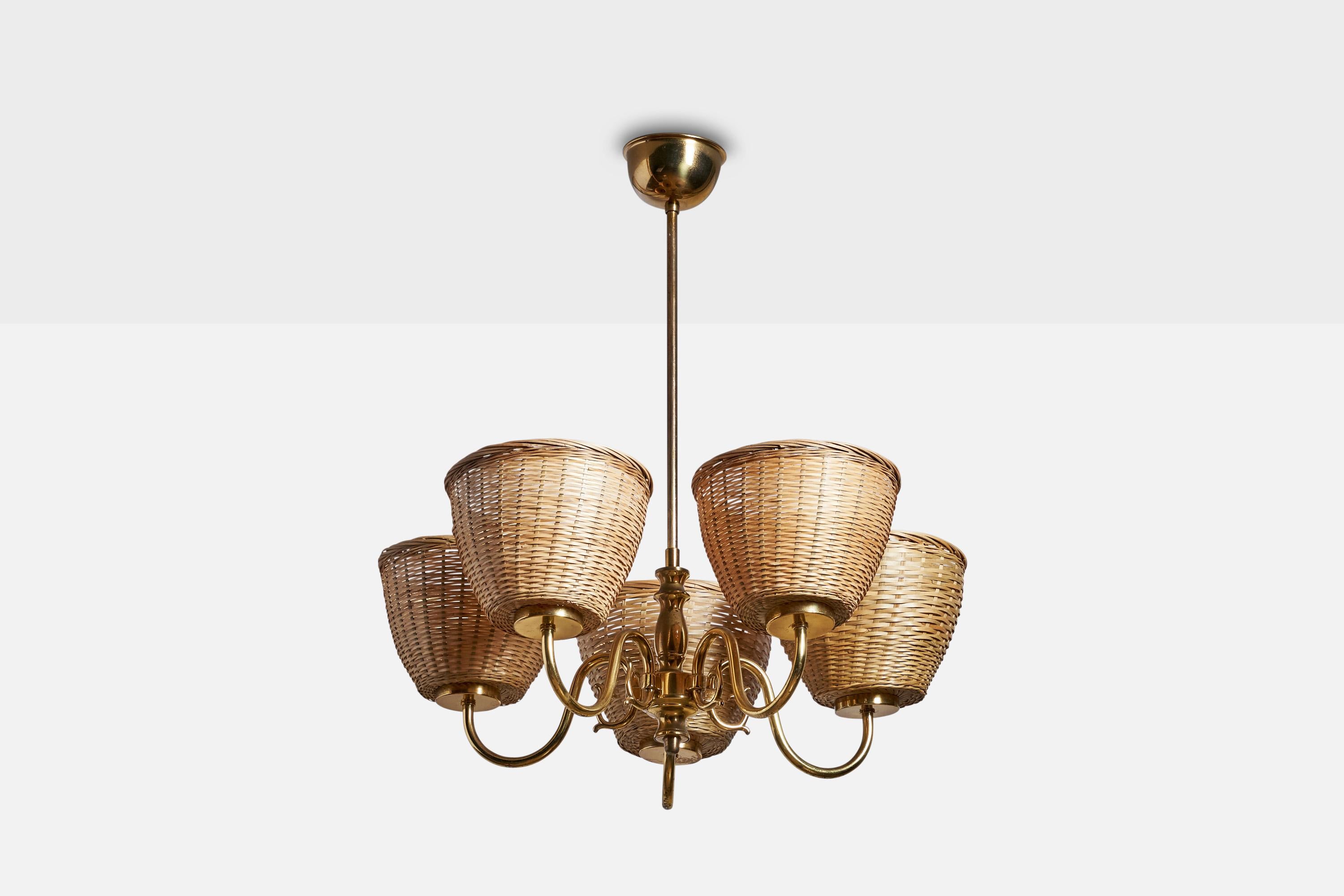 A brass and rattan chandelier designed and produced in Sweden, 1940s.

Dimensions of canopy (inches): 2” H x 3.5” Diameter
Socket takes standard E-26 bulbs. 5 sockets.There is no maximum wattage stated on the fixture. All lighting will be converted