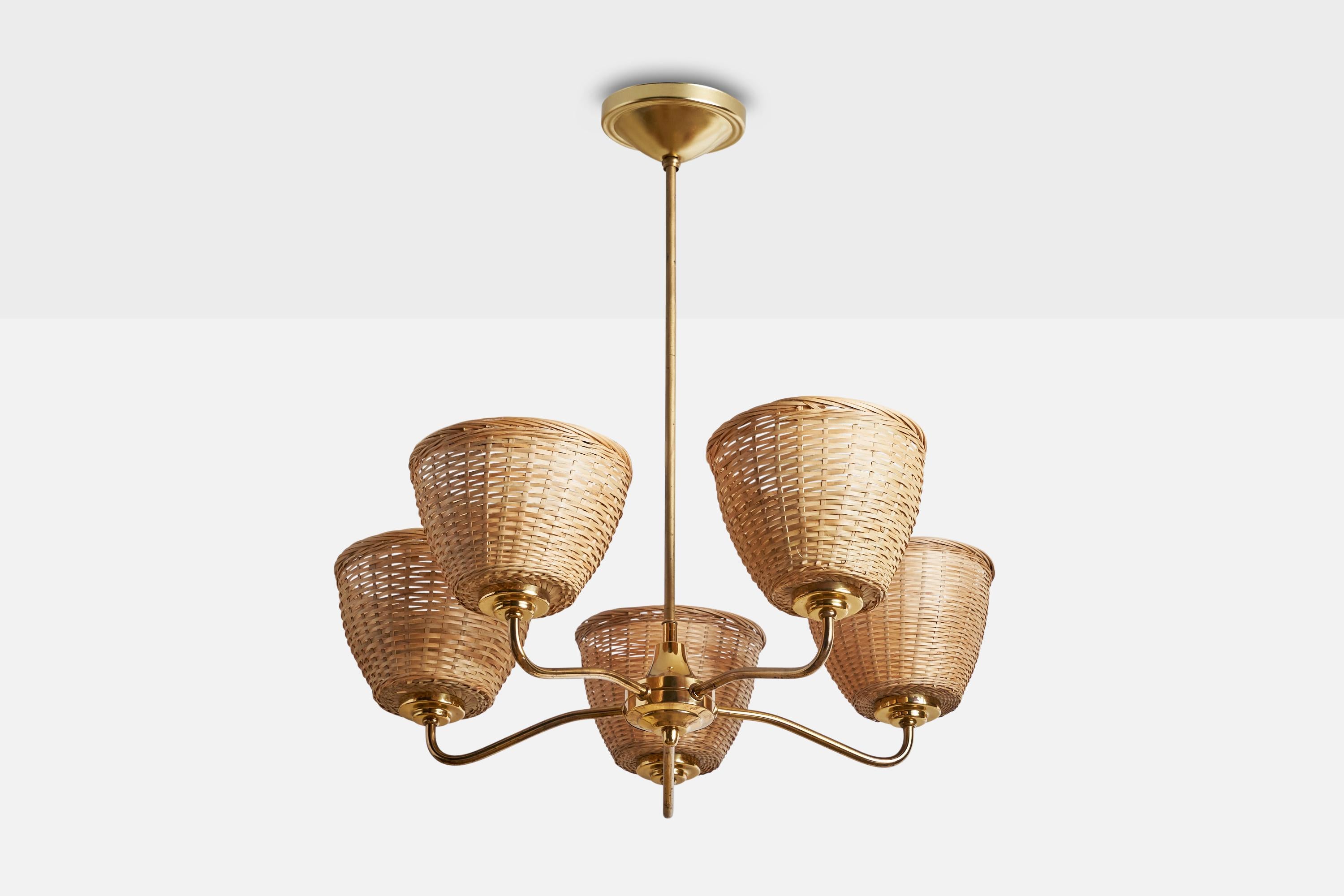 A brass and rattan chandelier designed and produced in Sweden, 1950s.

Dimensions of canopy (inches): 2”  H x 5”  Diameter
Socket takes standard E-14 bulbs. 5 sockets.There is no maximum wattage stated on the fixture. All lighting will be converted