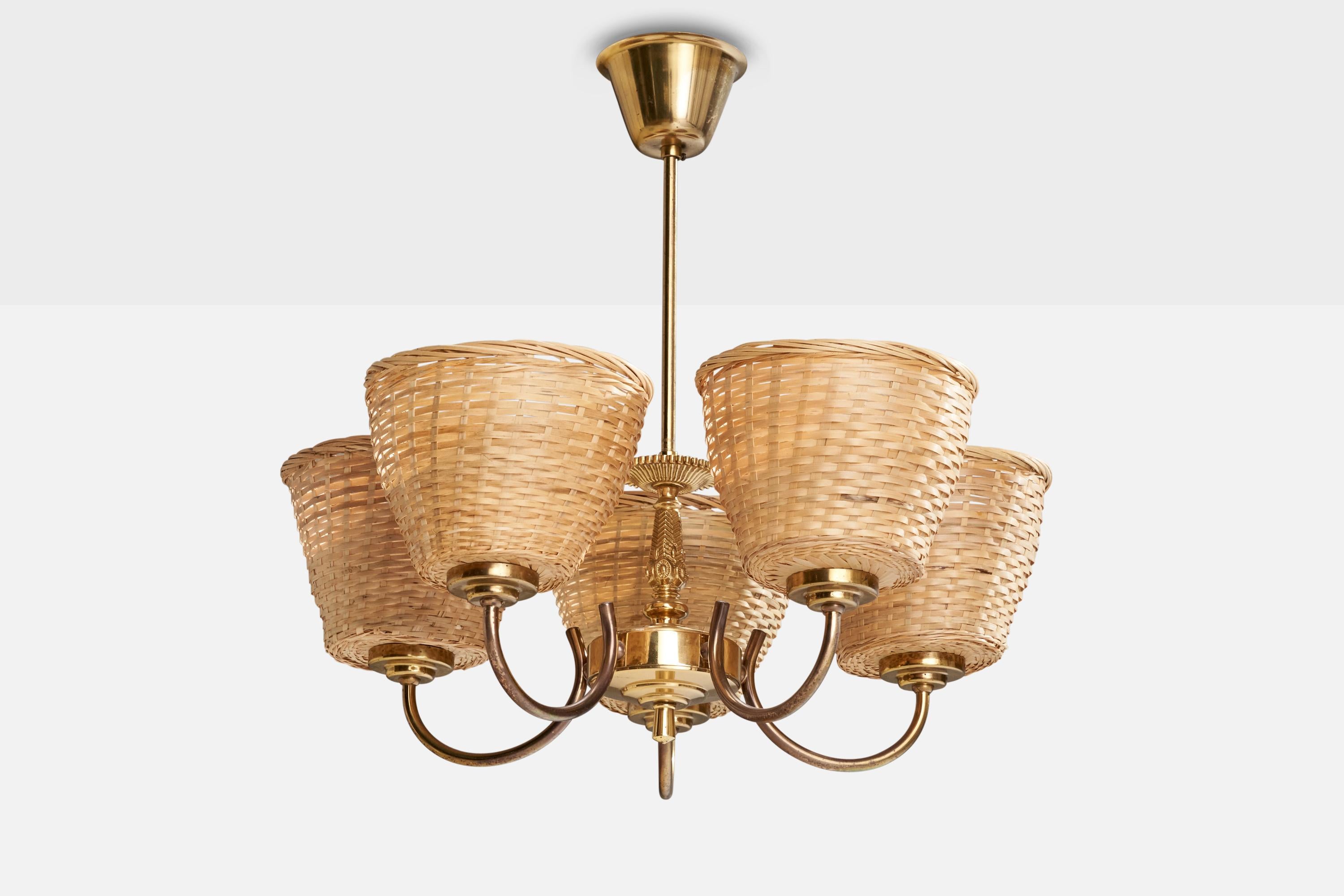 Lustre en laiton et en rotin conçu et produit en Suède, C.C. 1950.

Dimensions de l'auvent (pouces) : 2.88