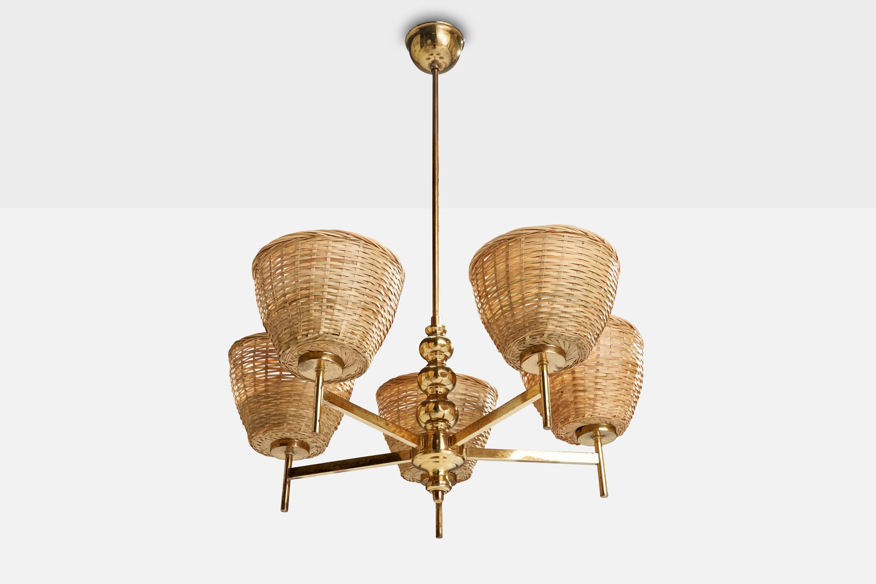 A brass and rattan chandelier designed and produced in Sweden, c. 1960s.

Dimensions of canopy (inches): 3.61” H x 2.28” Diameter
Socket takes standard E-26 bulbs. 5 socket.There is no maximum wattage stated on the fixture. All lighting will be