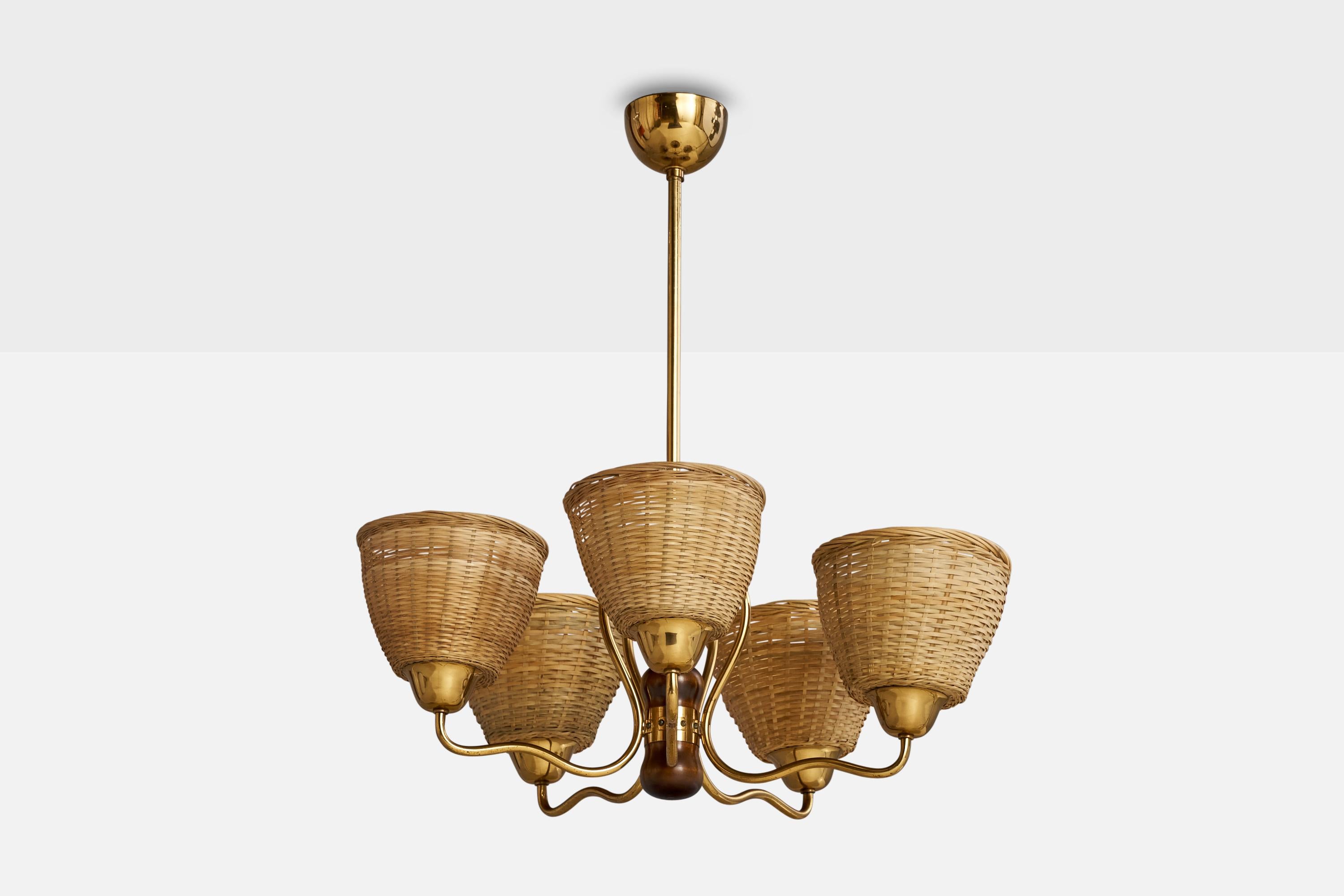 A brass, wood and rattan chandelier designed and produced in Sweden, 1940s.

Dimensions of canopy (inches): 2.5” H x 3.75” Diameter
Socket takes standard E-26 bulbs. 5 sockets.There is no maximum wattage stated on the fixture. All lighting will be