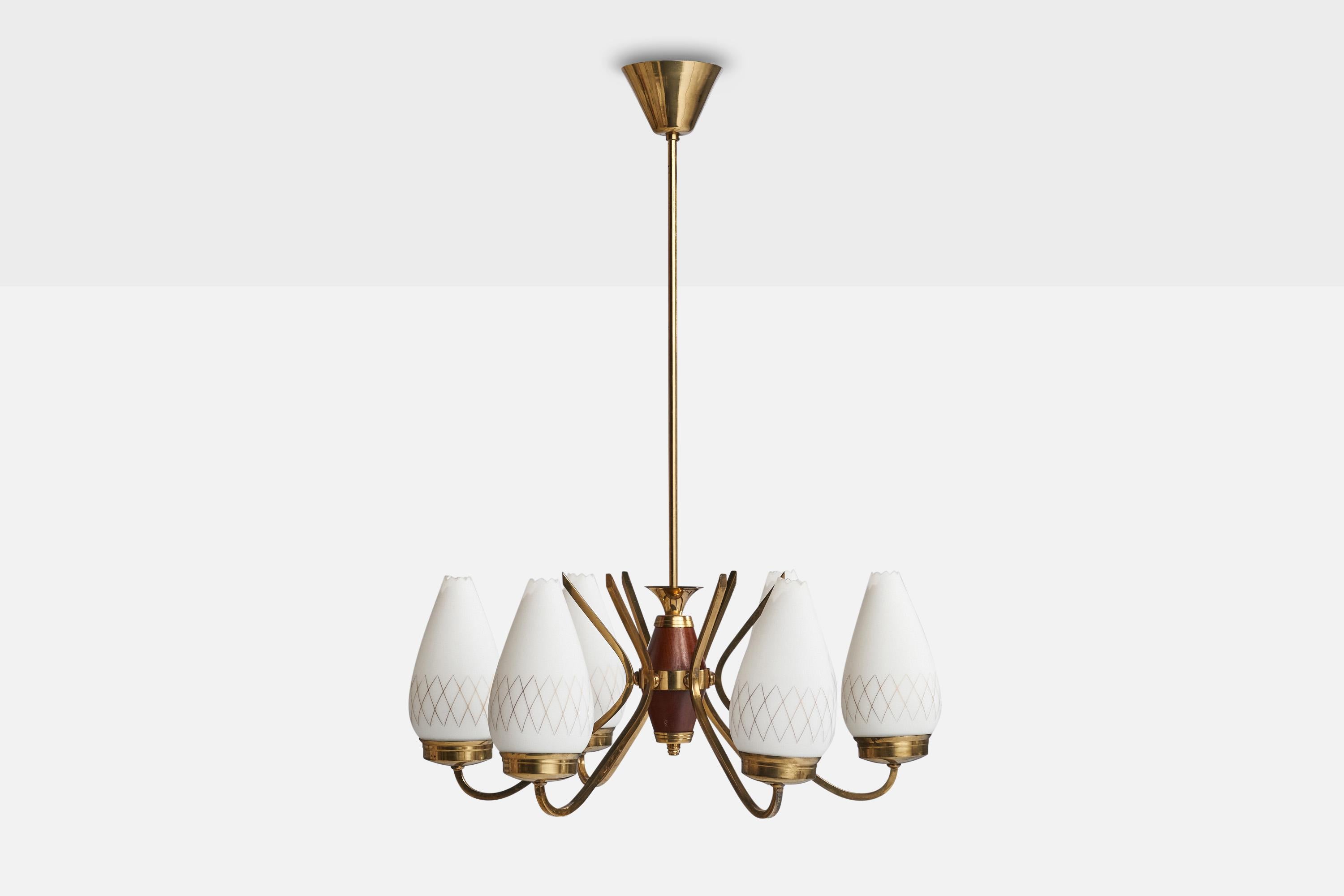A brass, teak and opaline glass chandelier designed and produced in Sweden, 1950s.

Dimensions of canopy (inches): 3” H x 4.25” Diameter
Socket takes standard E-26 bulbs. 6 sockets.There is no maximum wattage stated on the fixture. All lighting will