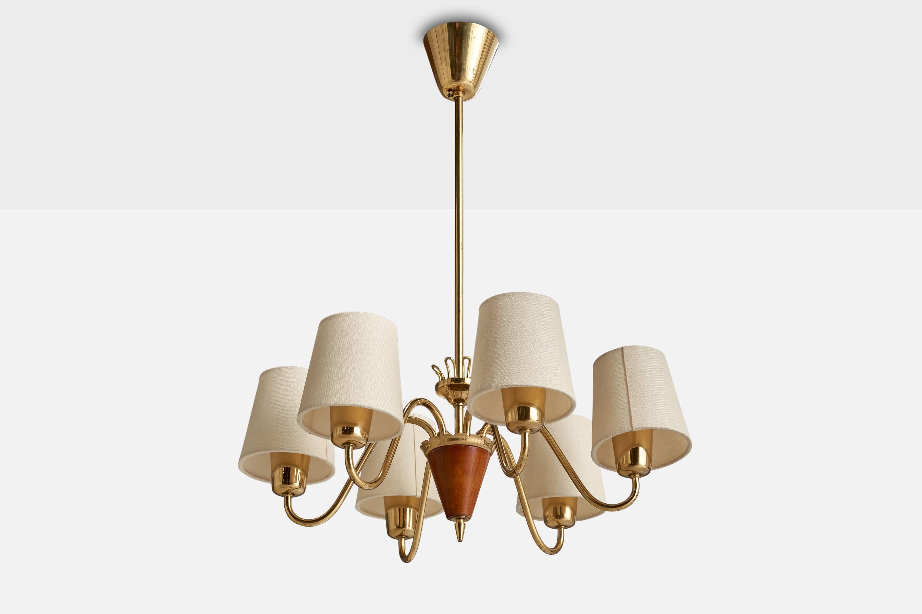A brass, wood and white fabric chandelier designed and produced in Sweden, c. 1940s.

Overall Dimensions (inches): 24.25” H x  18.25” Diameter
Dimensions of Canopy:  3.25” H x 3.625” W x 3.625” D
Stem length: 14.375”H
Bulb Specifications: E-26 