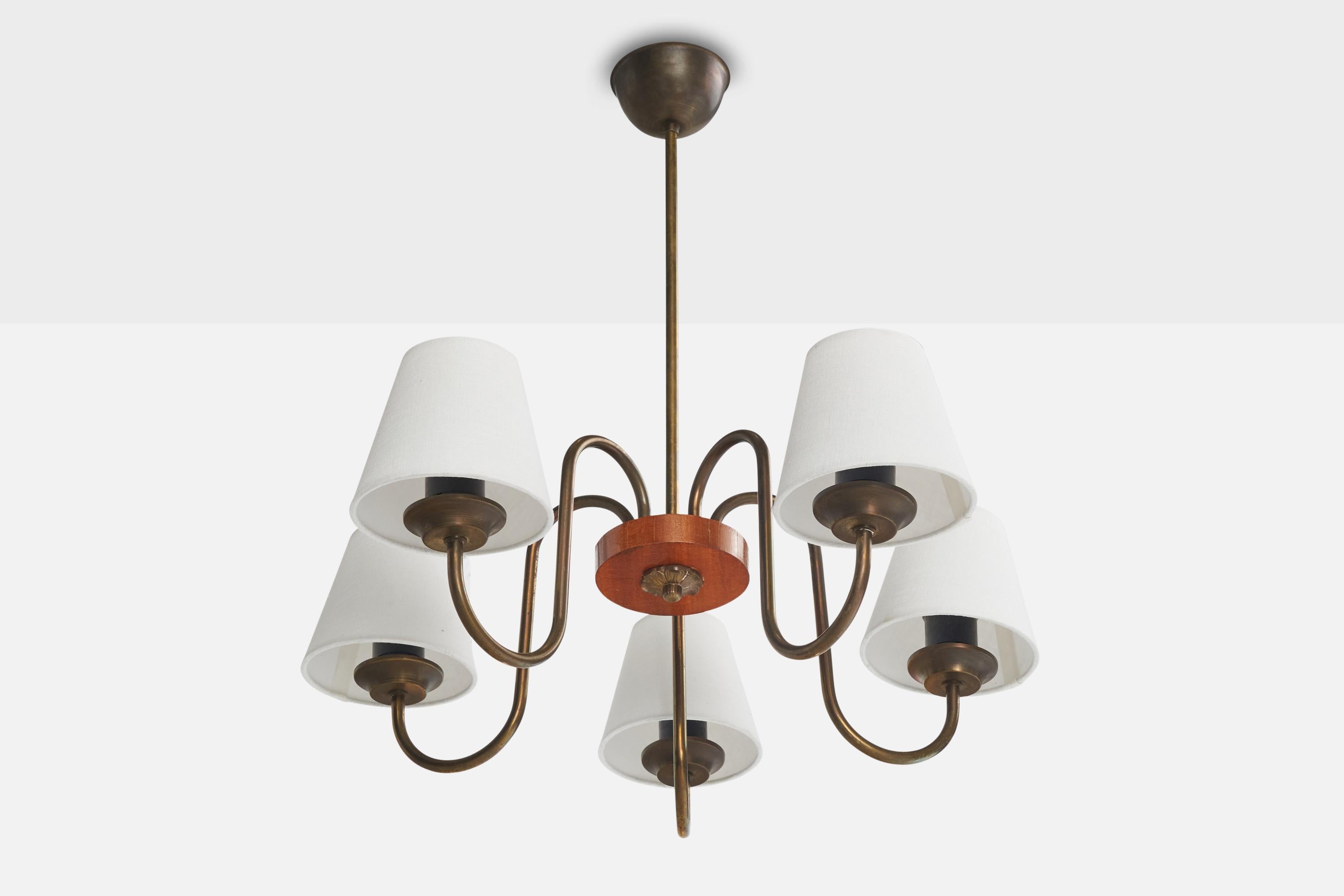 A brass, fabric and wood chandelier designed and produced in Sweden, c. 1940s.

Overall Dimensions (inches): 23.5” H x 22” Diameter

Dimensions of Canopy:  2.25” H x 3.875” diameter

Stem length: 14.625” H

Bulb Specifications: E-26 

Number of