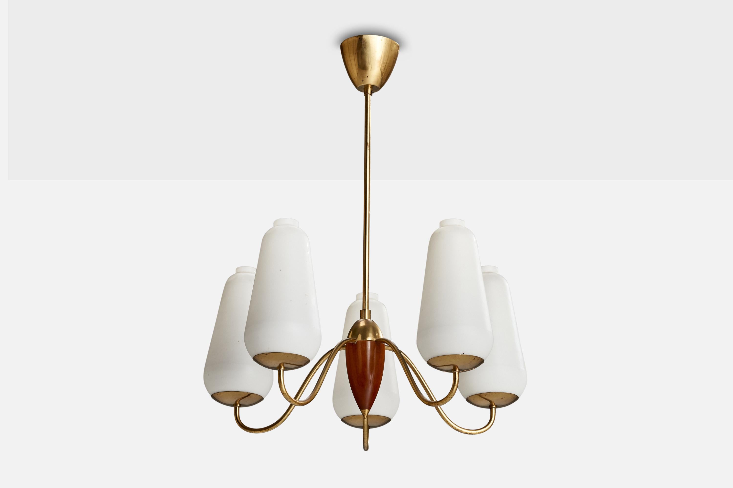 A brass, stained wood and opaline glass chandelier designed and produced in Sweden, c. 1940s.

Dimensions of canopy (inches): 3.21” H x 3.66” Diameter
Socket takes standard E-26 bulbs. 5 socket.There is no maximum wattage stated on the fixture. All