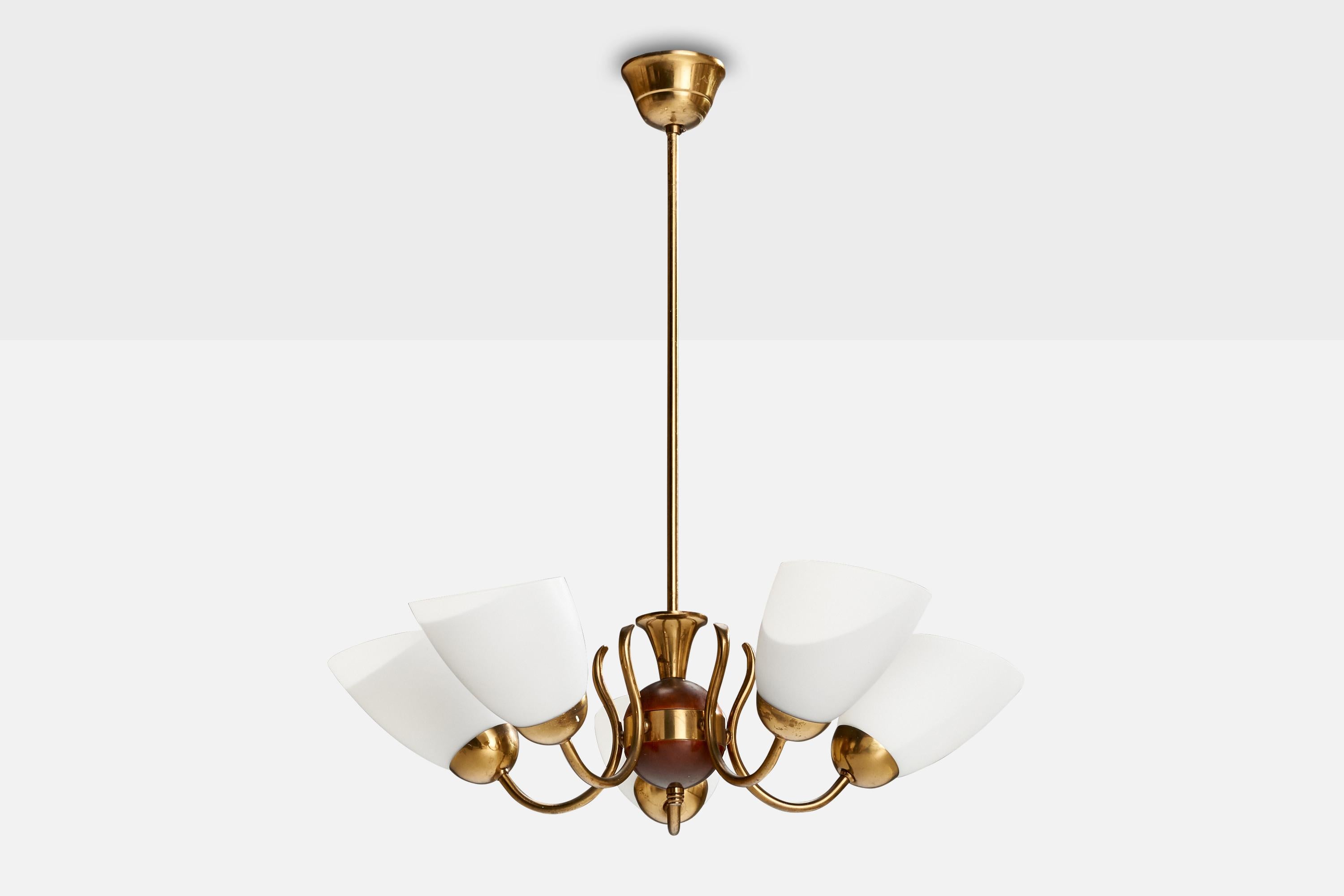 A brass, wood and opaline glass chandelier designed and produced in Sweden, c. 1940s.

Dimensions of canopy (inches): 2.47” H x 3.68” Diameter
Socket takes standard E-26 bulbs. 5 socket.There is no maximum wattage stated on the fixture. All lighting
