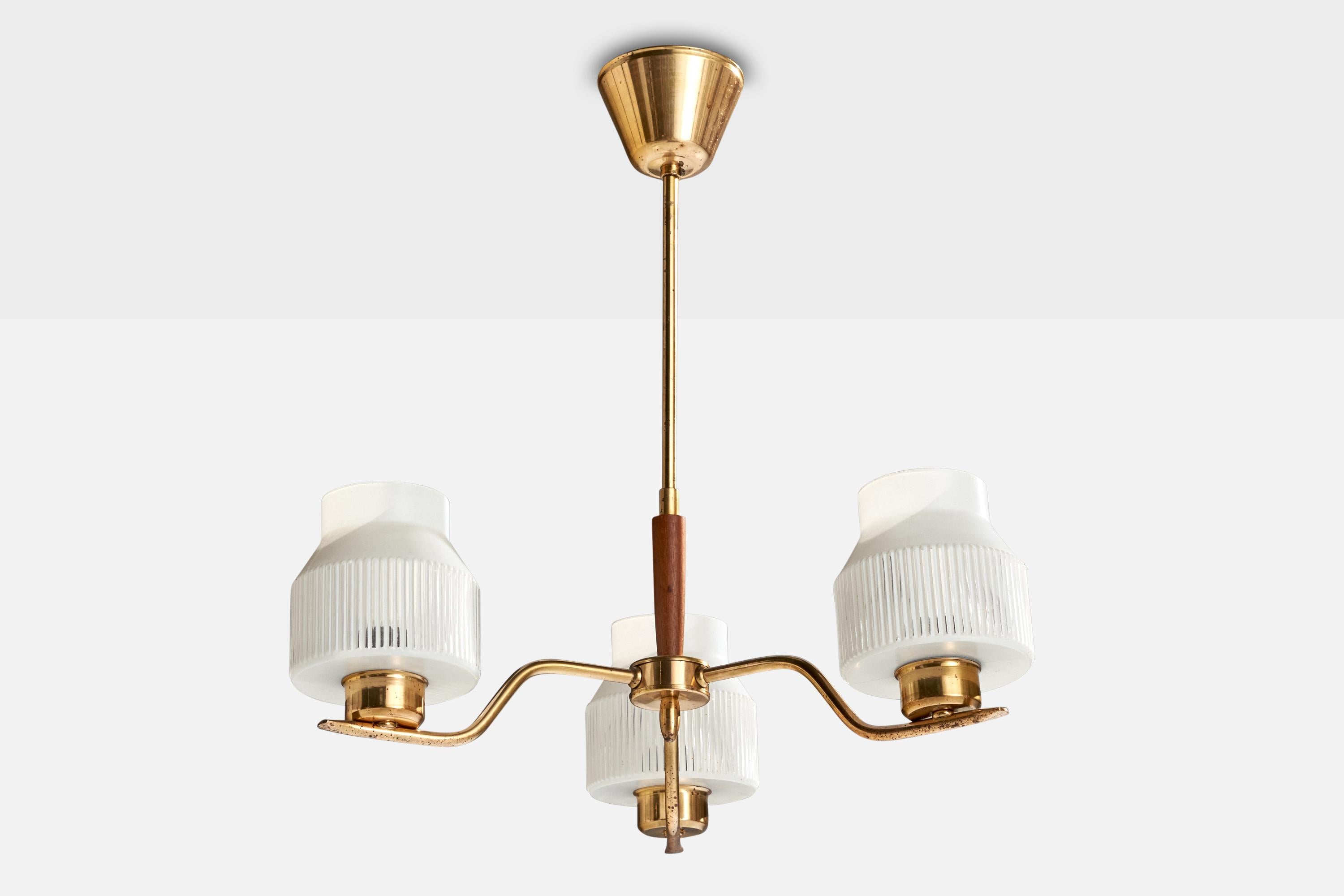 A brass, wood and opaline glass chandelier designed and produced in Sweden, c. 1950s.

Dimensions of canopy (inches): 3.00